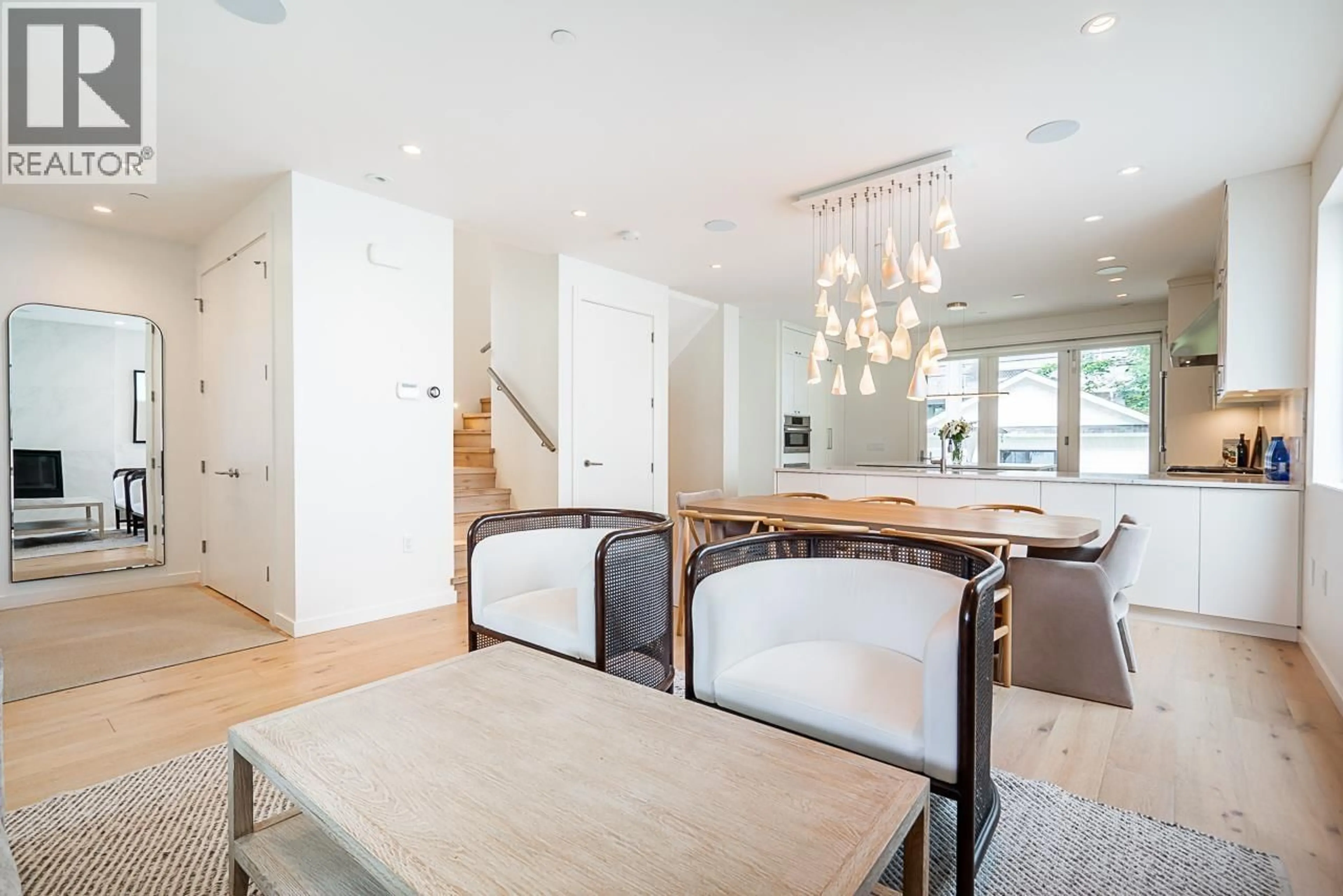 Open concept kitchen, wood/laminate floor for 785 20TH AVENUE, Vancouver British Columbia V5Z1Y2