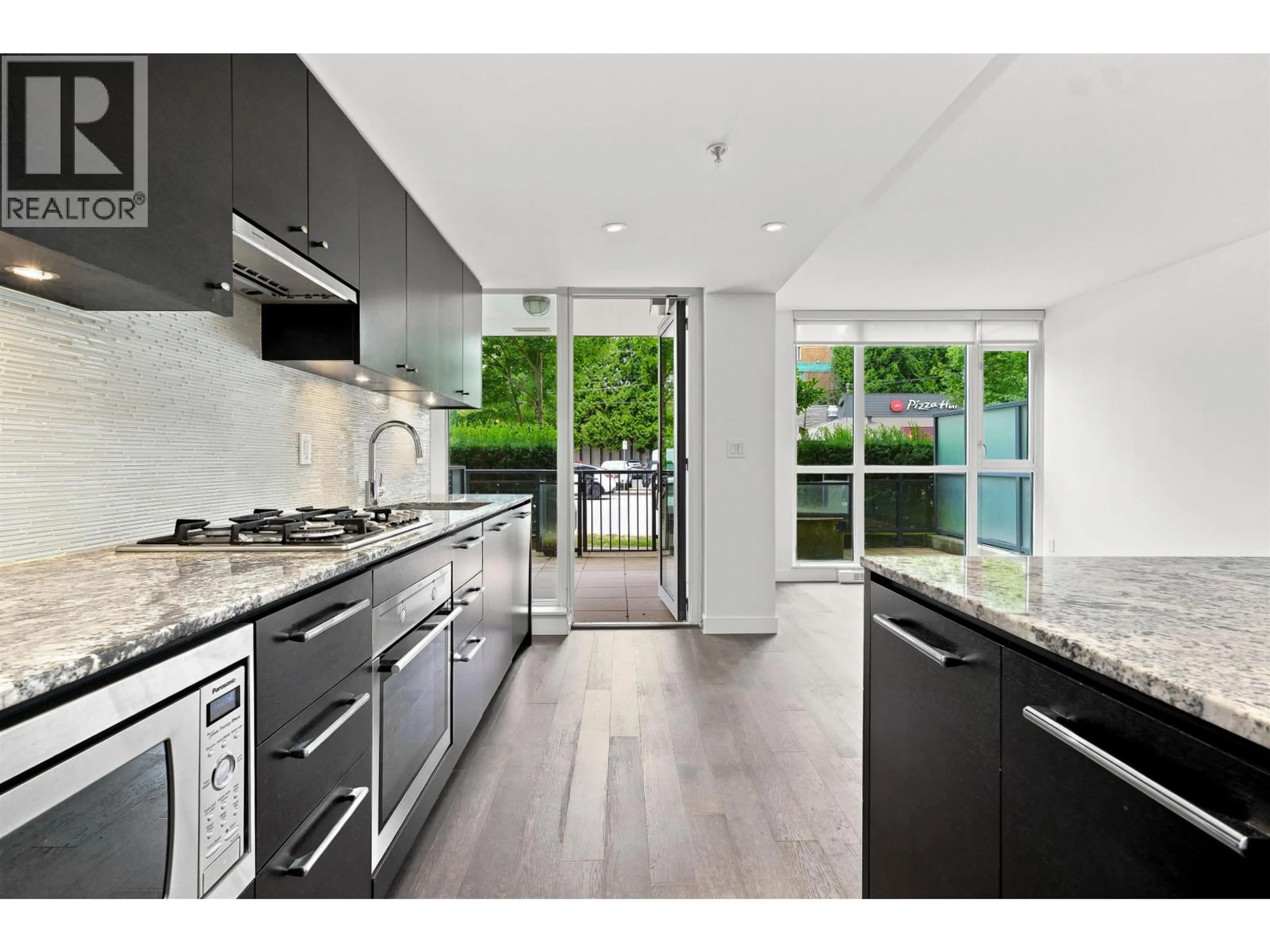 Contemporary kitchen, unknown for 108 - 6180 COONEY ROAD, Richmond British Columbia V6Y0H2