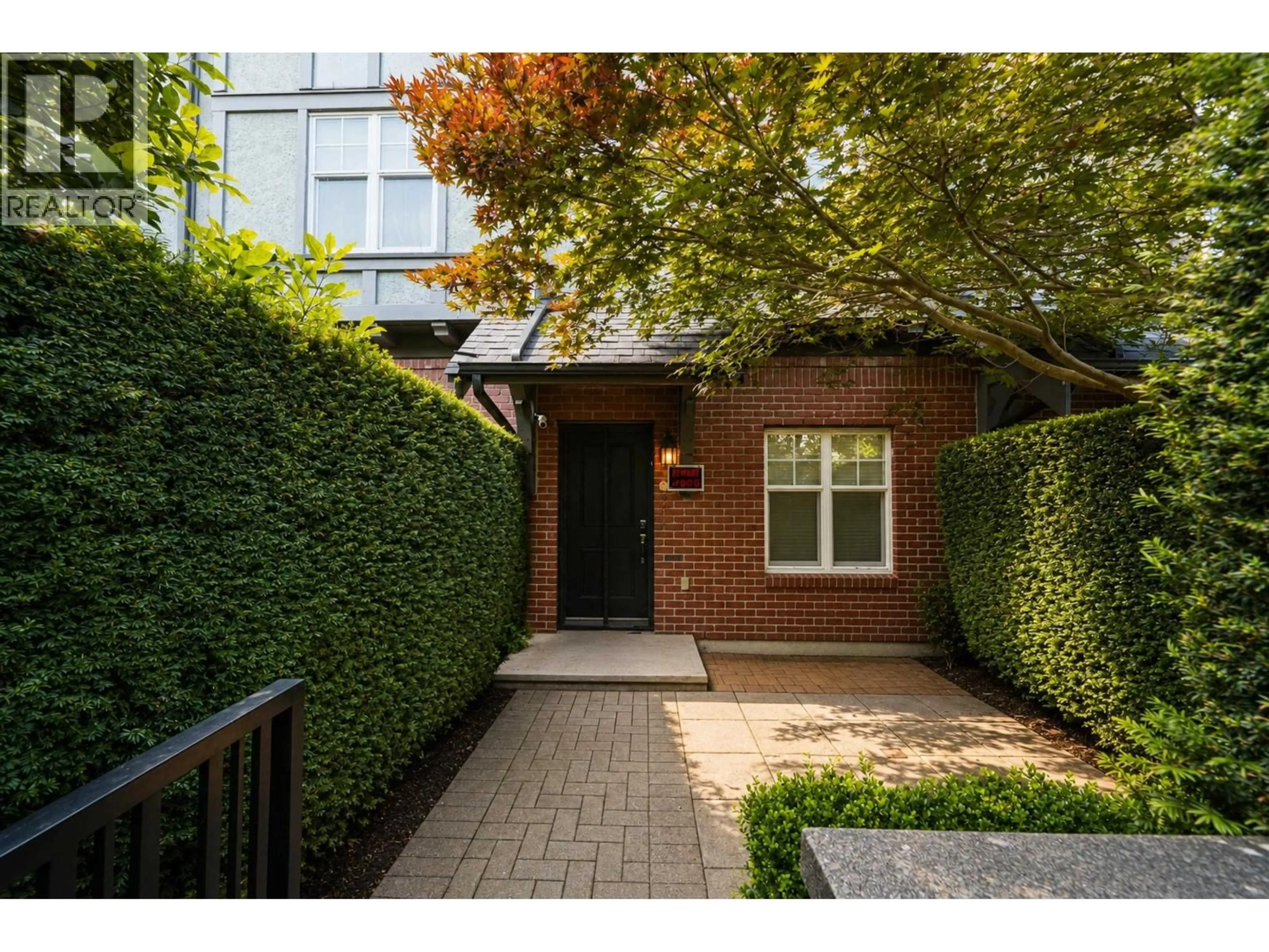 Home with brick exterior material, street for 5603 WILLOW STREET, Vancouver British Columbia V5Z3S3