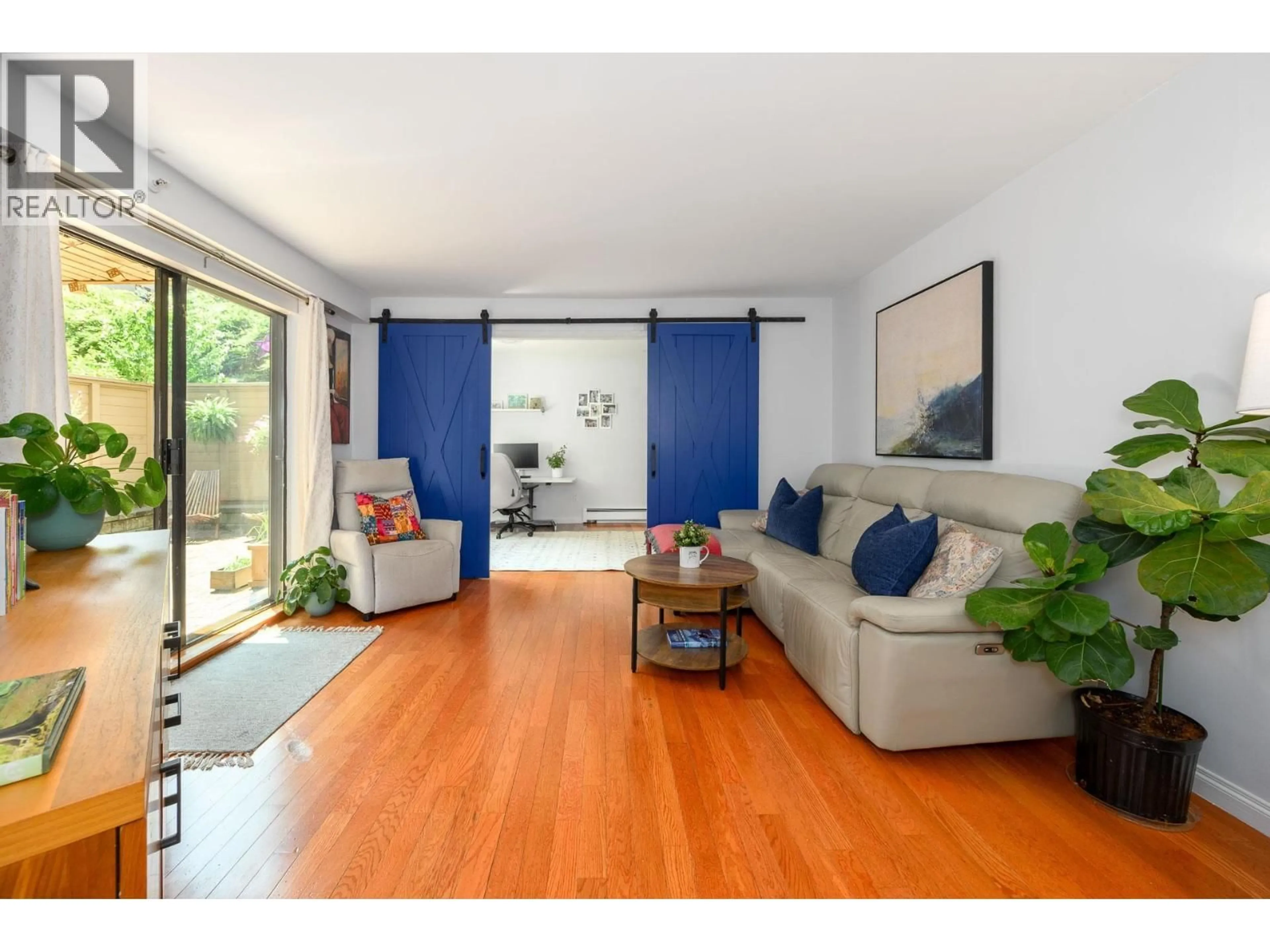 Living room with furniture, wood/laminate floor for 104 - 1500 PENDRELL STREET, Vancouver British Columbia V6G3A5