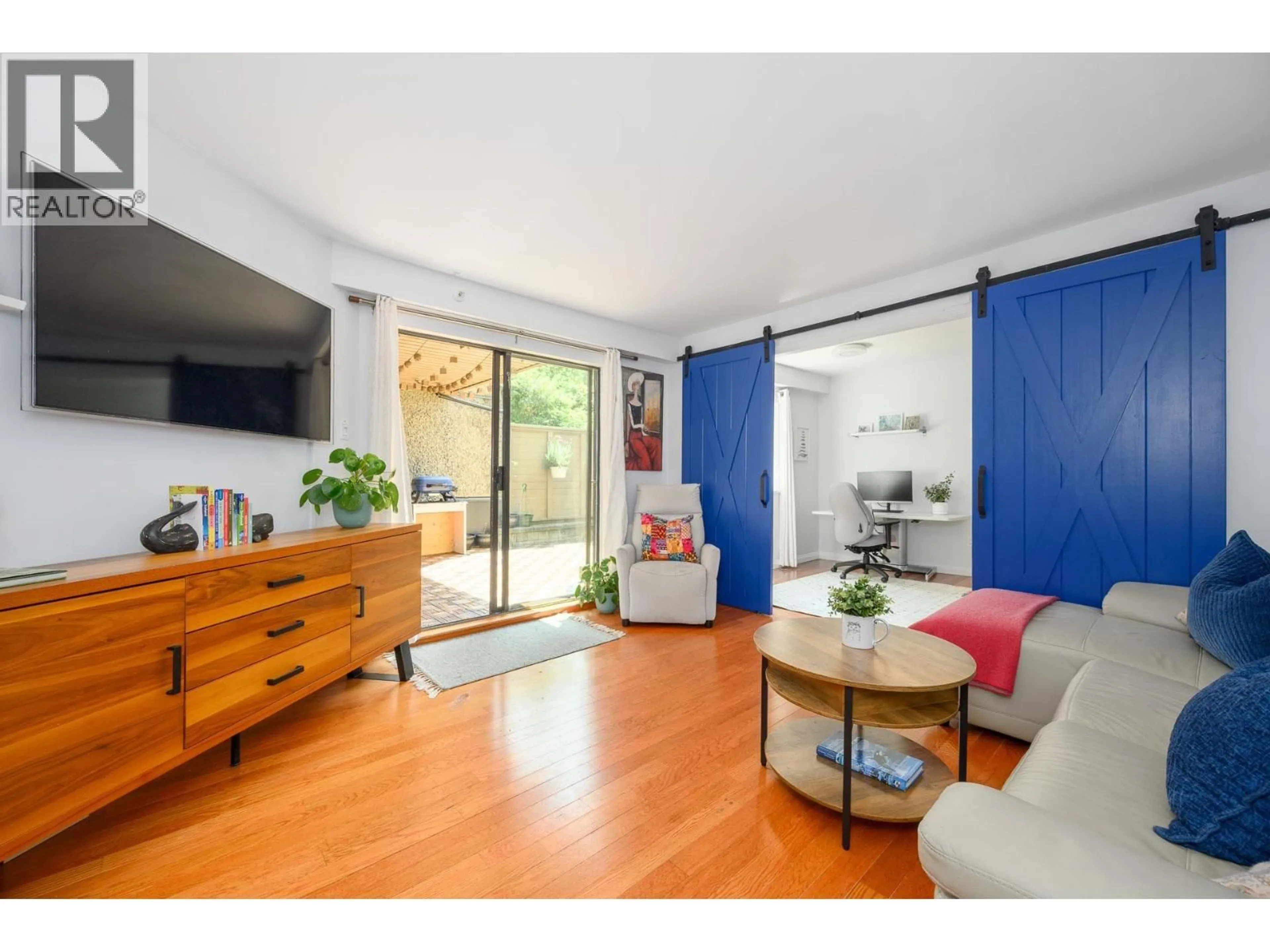 Living room with furniture, wood/laminate floor for 104 - 1500 PENDRELL STREET, Vancouver British Columbia V6G3A5
