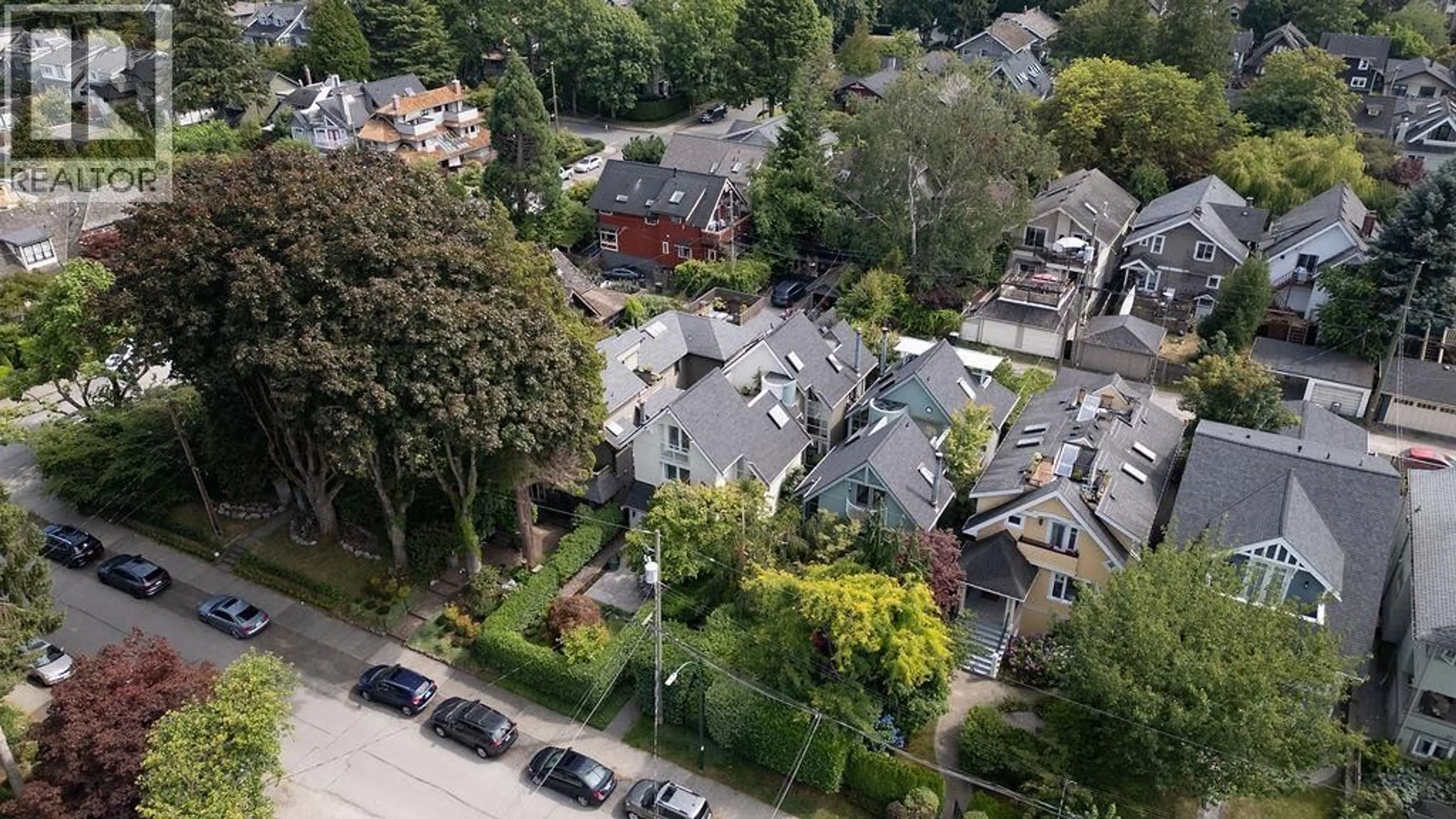 A pic from outside/outdoor area/front of a property/back of a property/a pic from drone, street for 3420 1ST AVENUE, Vancouver British Columbia V6R1G7