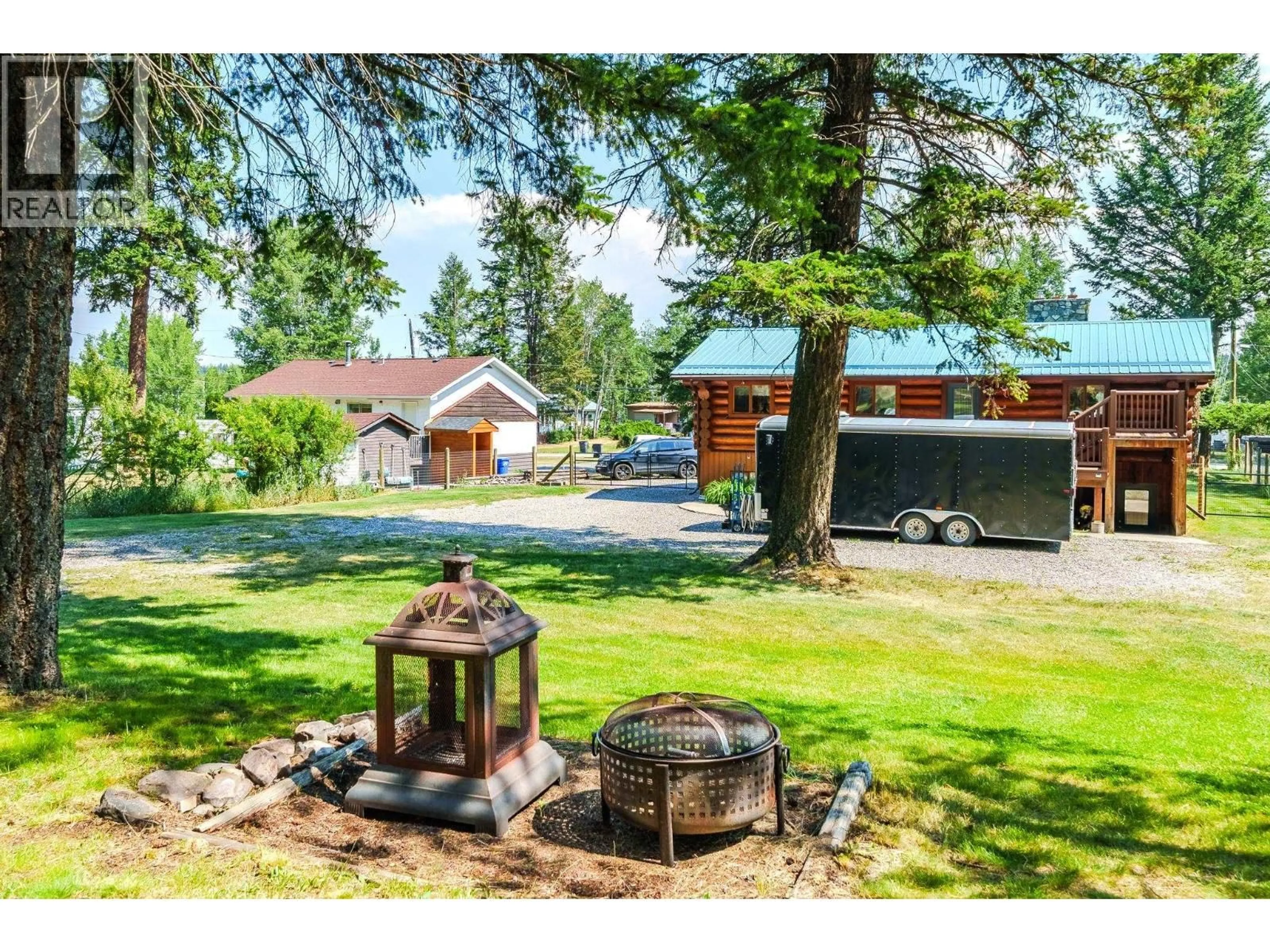 A pic from outside/outdoor area/front of a property/back of a property/a pic from drone, unknown for 5406 PARK DRIVE, 103 Mile House British Columbia V0K2E1