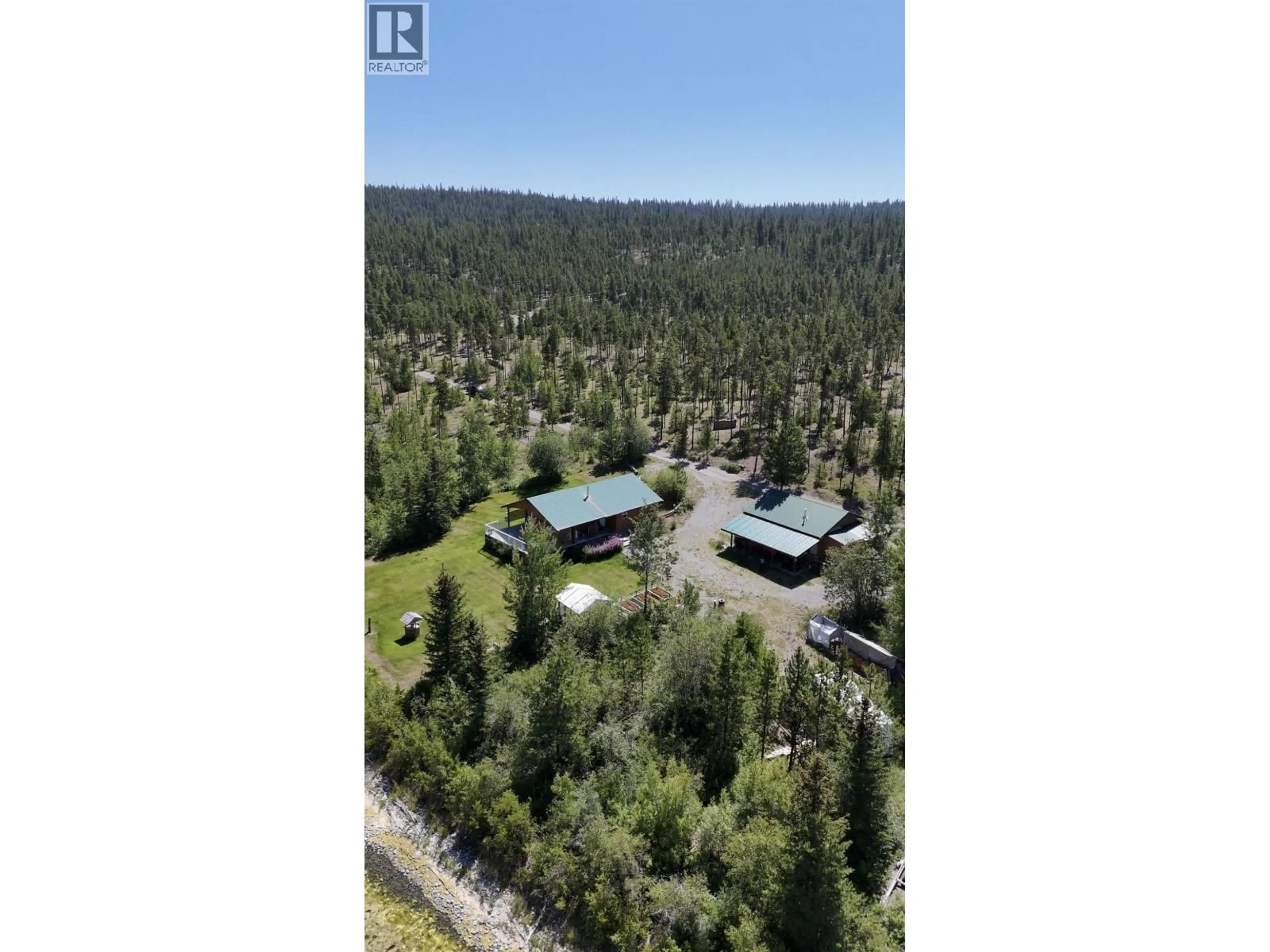 A pic from outside/outdoor area/front of a property/back of a property/a pic from drone, forest/trees view for 3608 PUNTZI LAKE ROAD, Chilcotin British Columbia V0L1H0