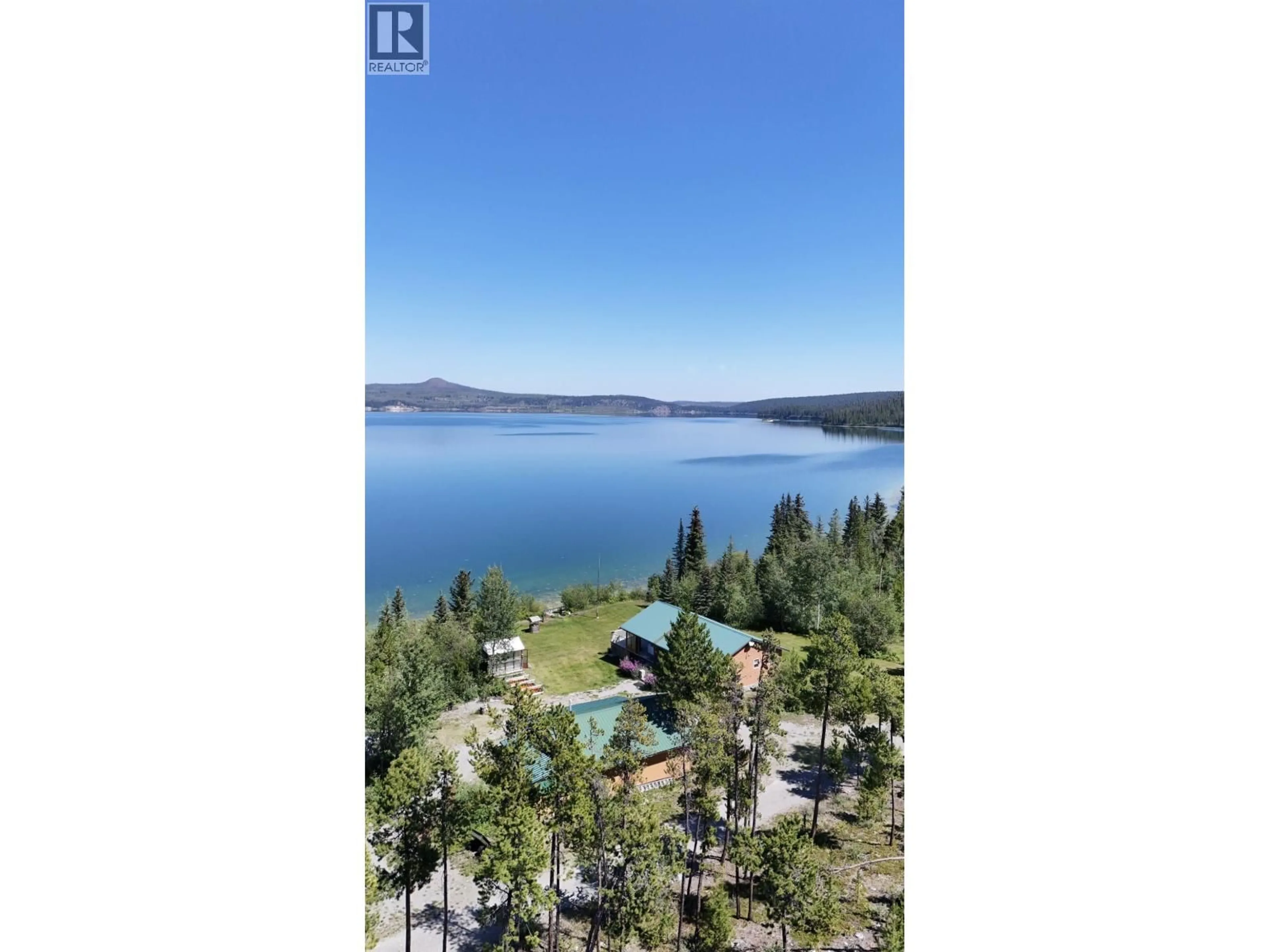 A pic from outside/outdoor area/front of a property/back of a property/a pic from drone, water/lake/river/ocean view for 3608 PUNTZI LAKE ROAD, Chilcotin British Columbia V0L1H0