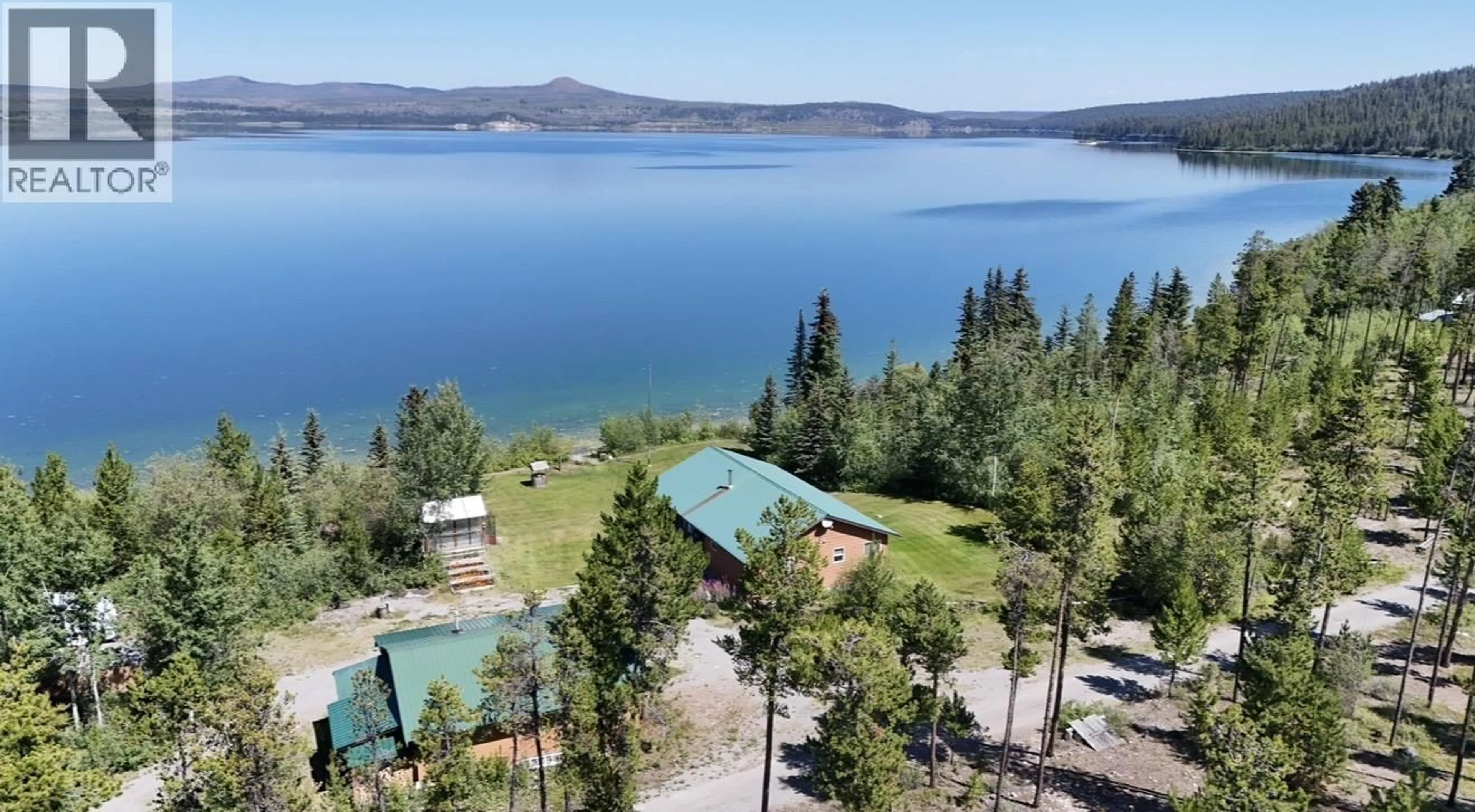 A pic from outside/outdoor area/front of a property/back of a property/a pic from drone, water/lake/river/ocean view for 3608 PUNTZI LAKE ROAD, Chilcotin British Columbia V0L1H0