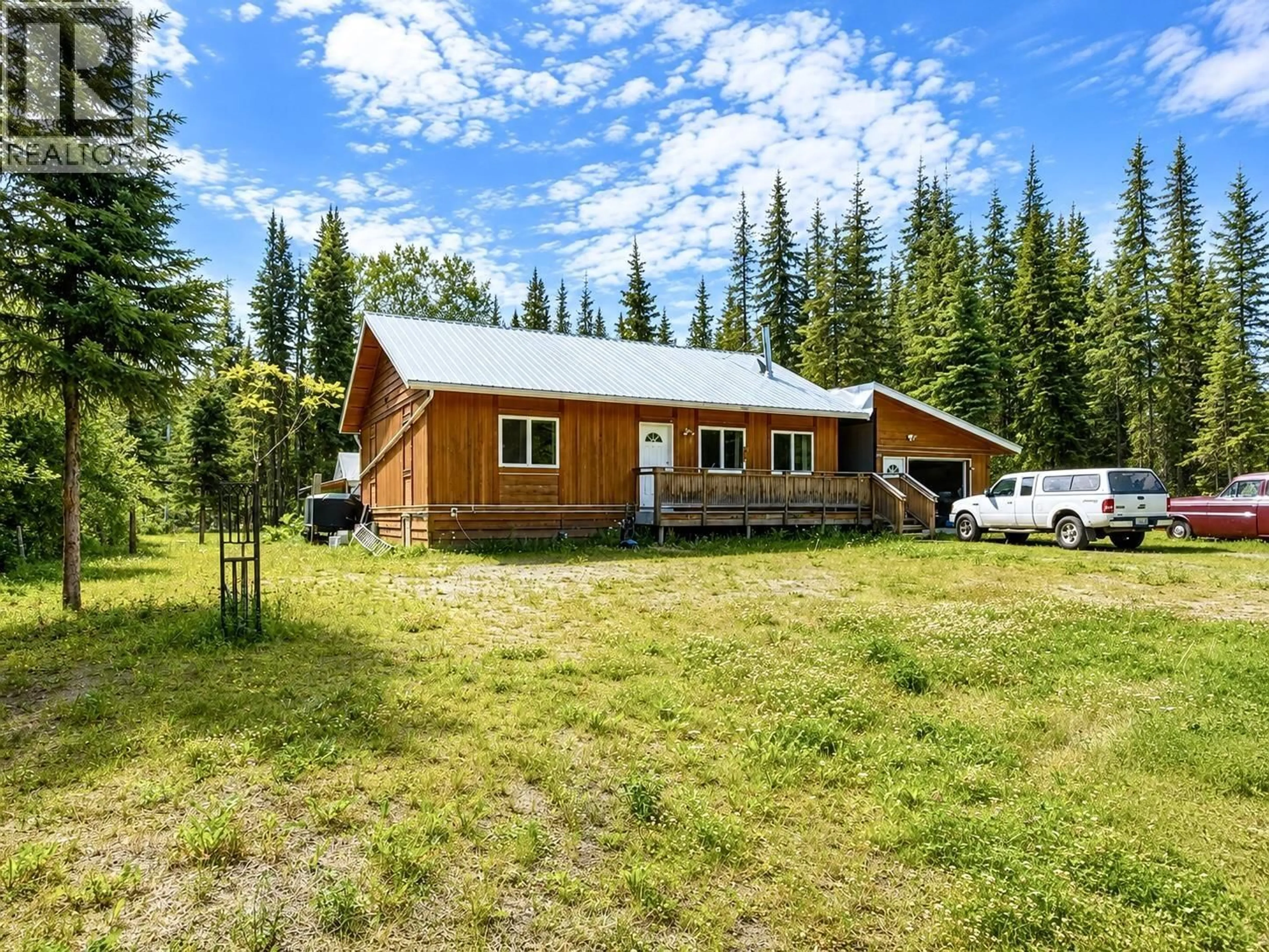 A pic from outside/outdoor area/front of a property/back of a property/a pic from drone, unknown for 7636 KING ROAD, 100 Mile House British Columbia V0K1X3
