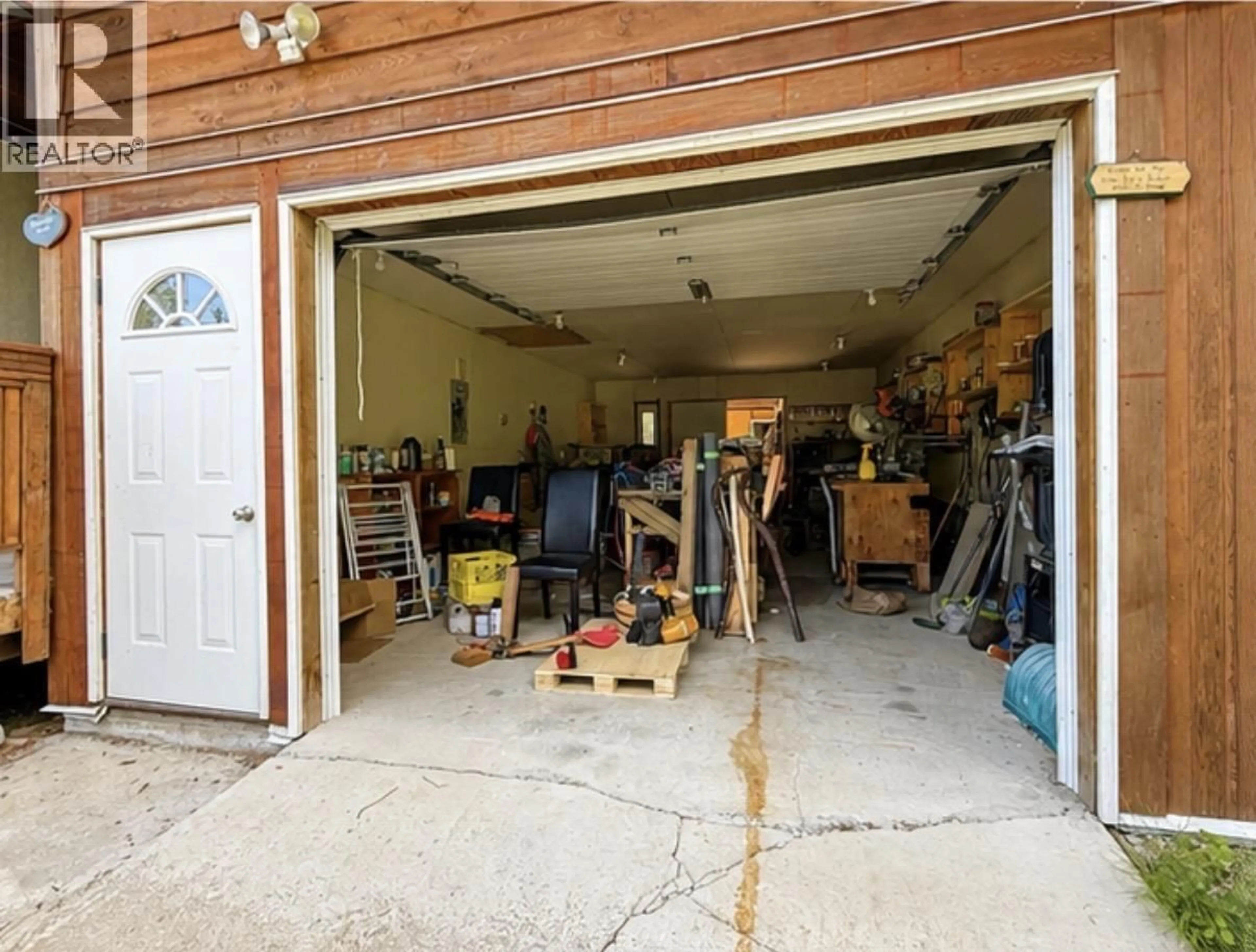 Indoor garage for 7636 KING ROAD, 100 Mile House British Columbia V0K1X3