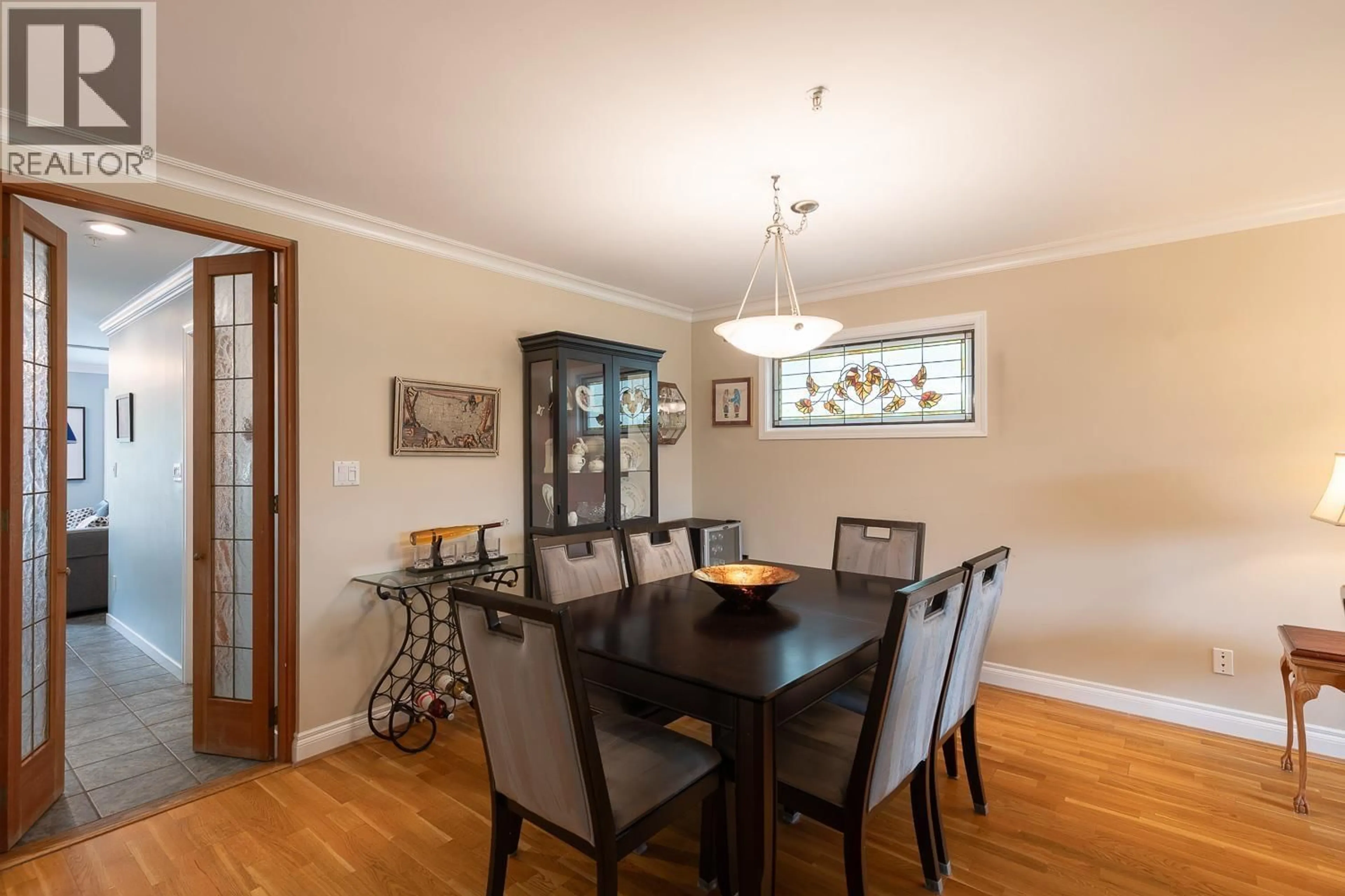 Dining room, wood/laminate floor for 1844 10TH AVENUE, Vancouver British Columbia V6J2A7