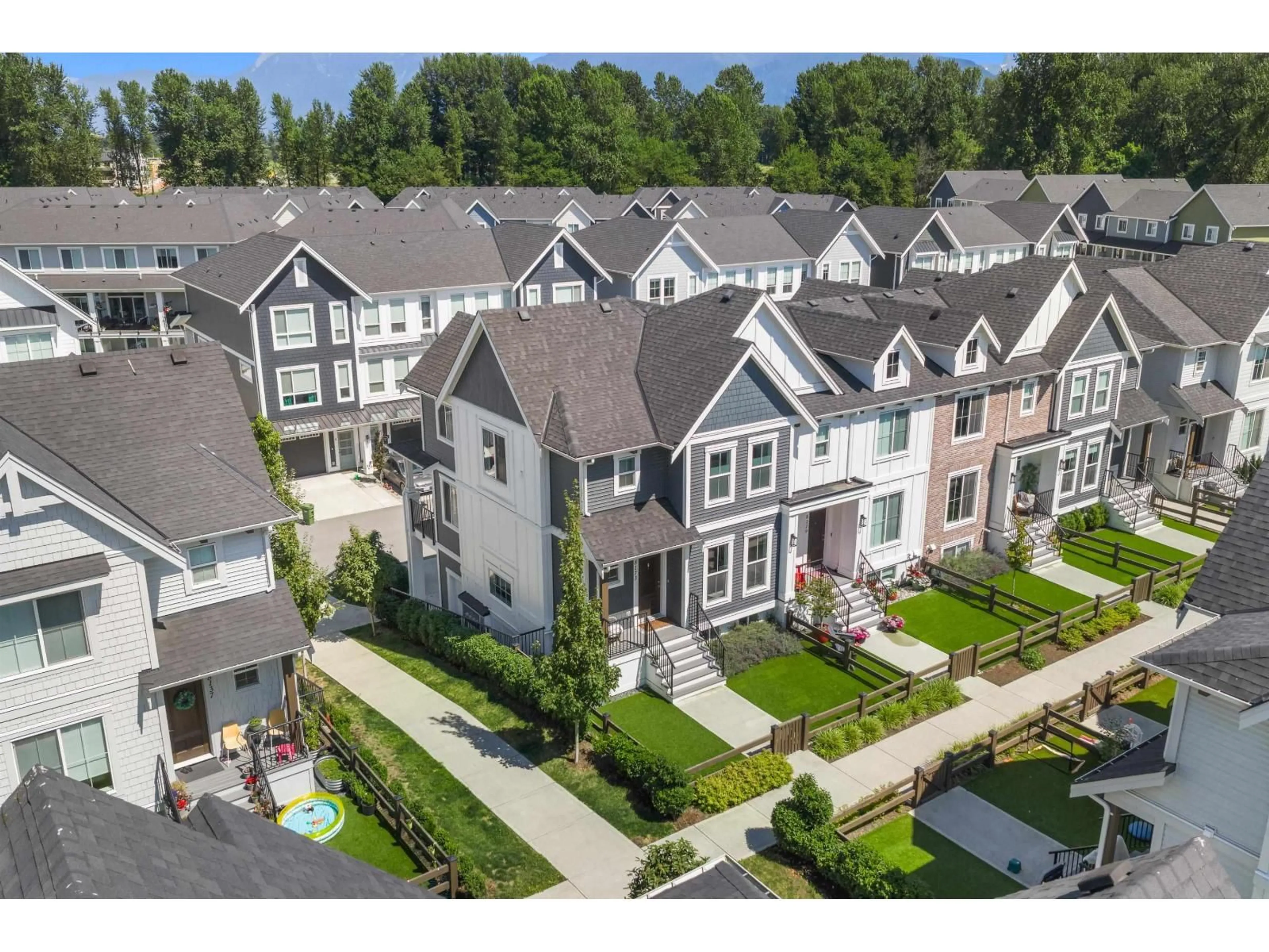 A pic from outside/outdoor area/front of a property/back of a property/a pic from drone, street for 8173 FOXFERN ROAD, Chilliwack British Columbia V2R6G6