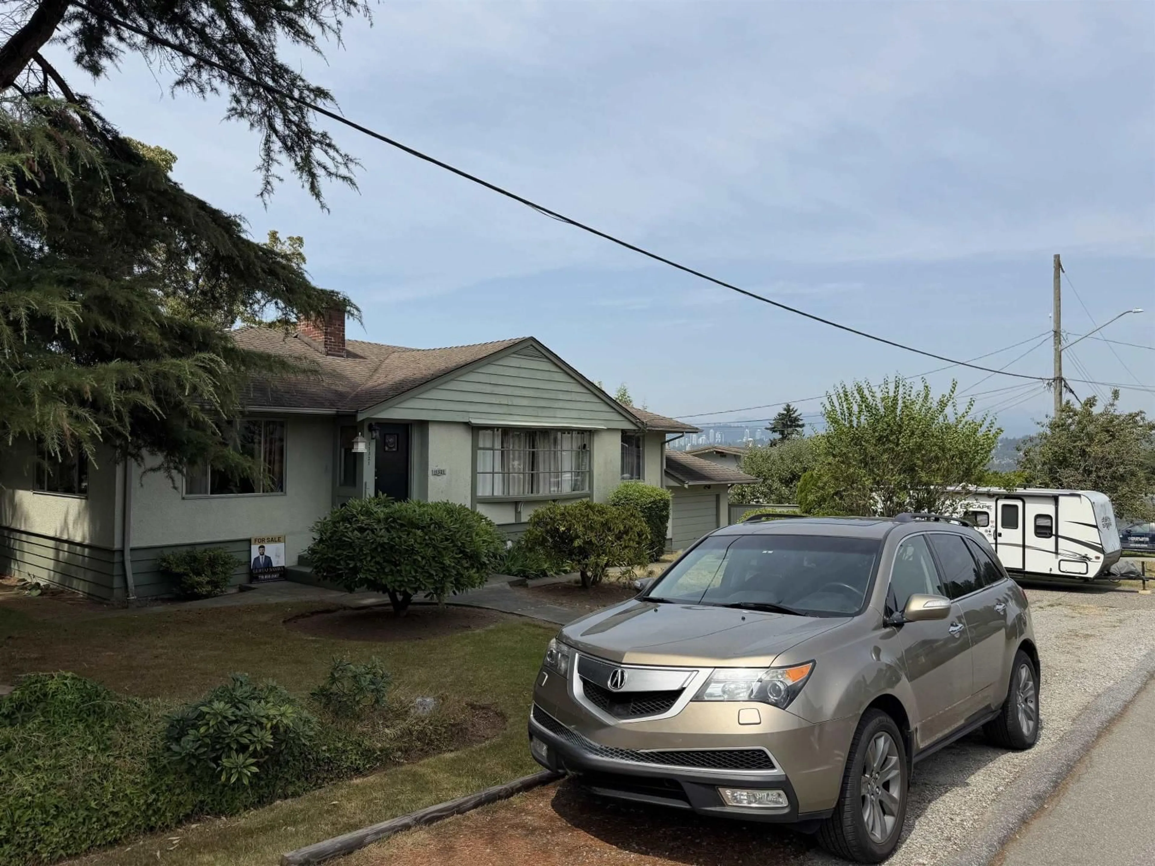 A pic from outside/outdoor area/front of a property/back of a property/a pic from drone, street for 11321 136A STREET, Surrey British Columbia V3R3C4