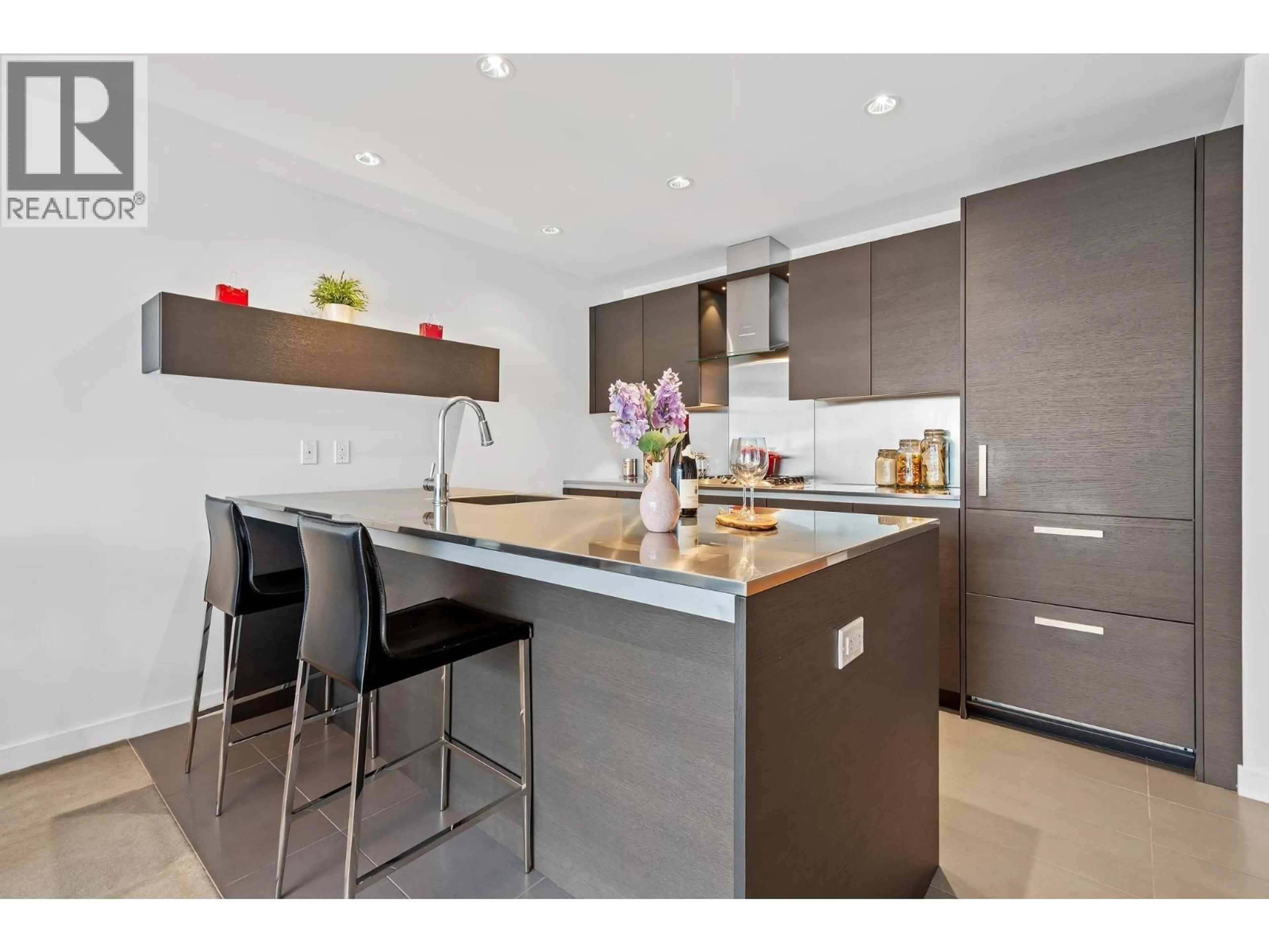 Open concept kitchen, wood/laminate floor for 1102 - 5177 BRIGHOUSE WAY, Richmond British Columbia V7C0A7