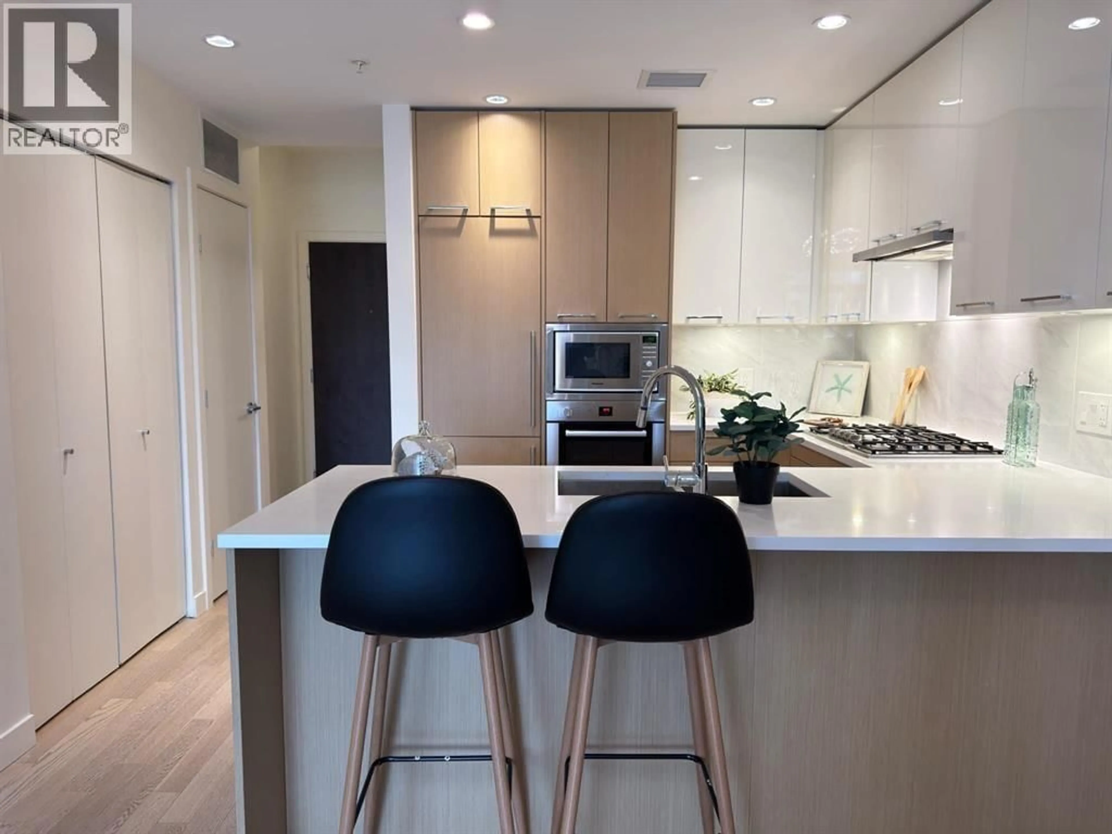 Contemporary kitchen, wood/laminate floor for 321 - 4033 MAY DRIVE, Richmond British Columbia V6X0T3
