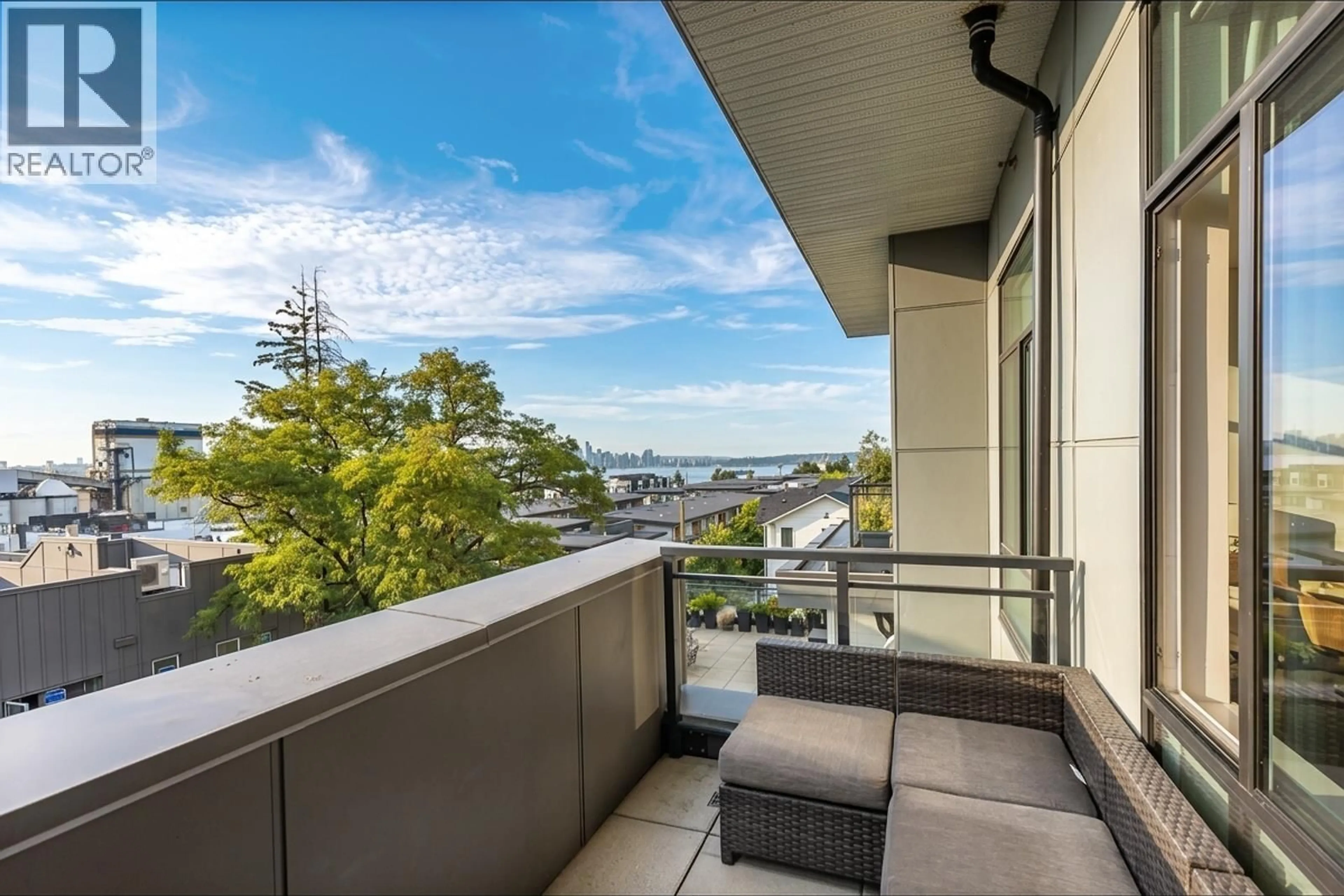 Balcony in the apartment, city buildings view from balcony for 403 - 615 3RD STREET, North Vancouver British Columbia V7L0G3
