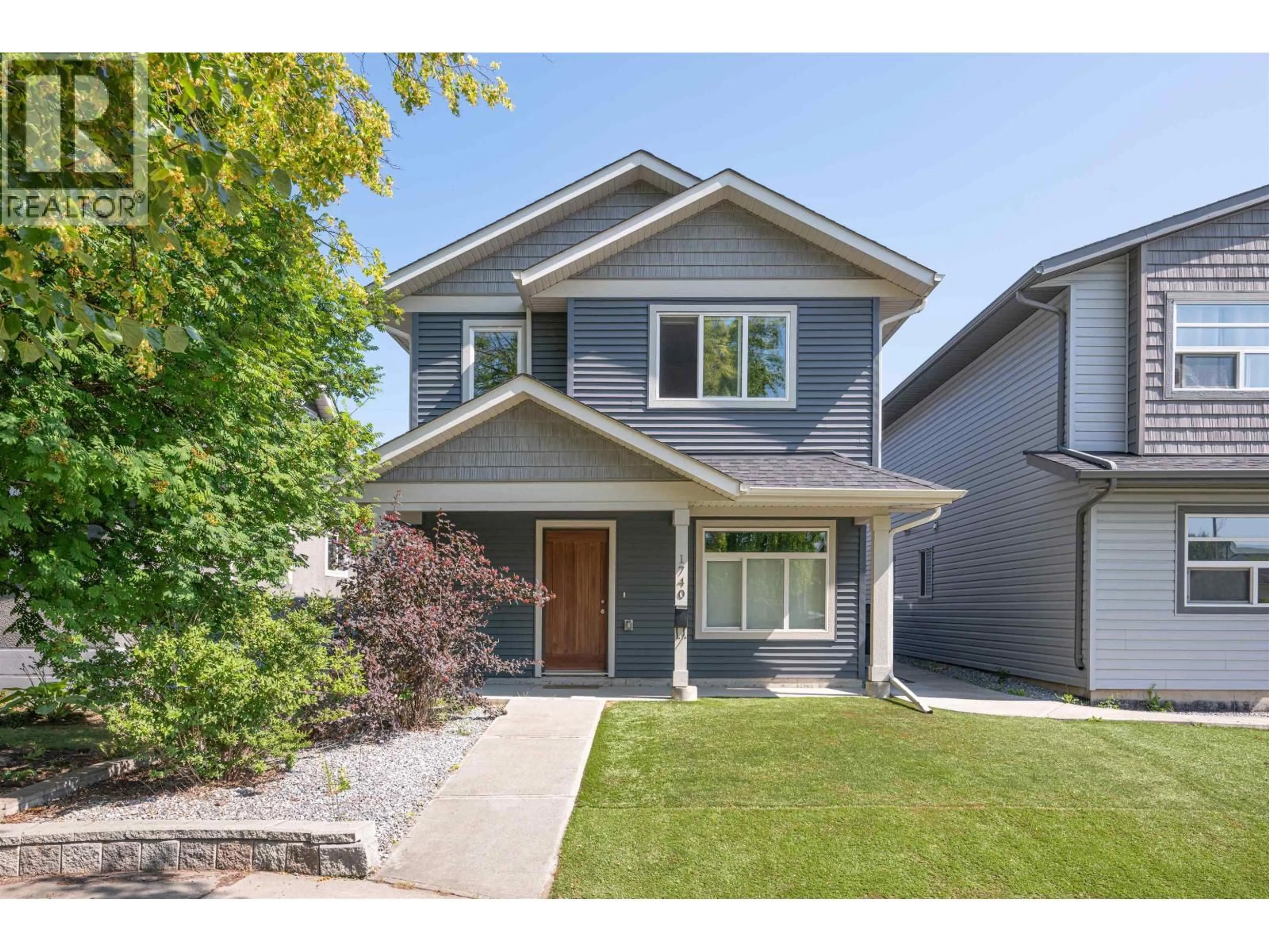 Home with vinyl exterior material, street for 1740 5TH AVENUE, Prince George British Columbia V2L3M3