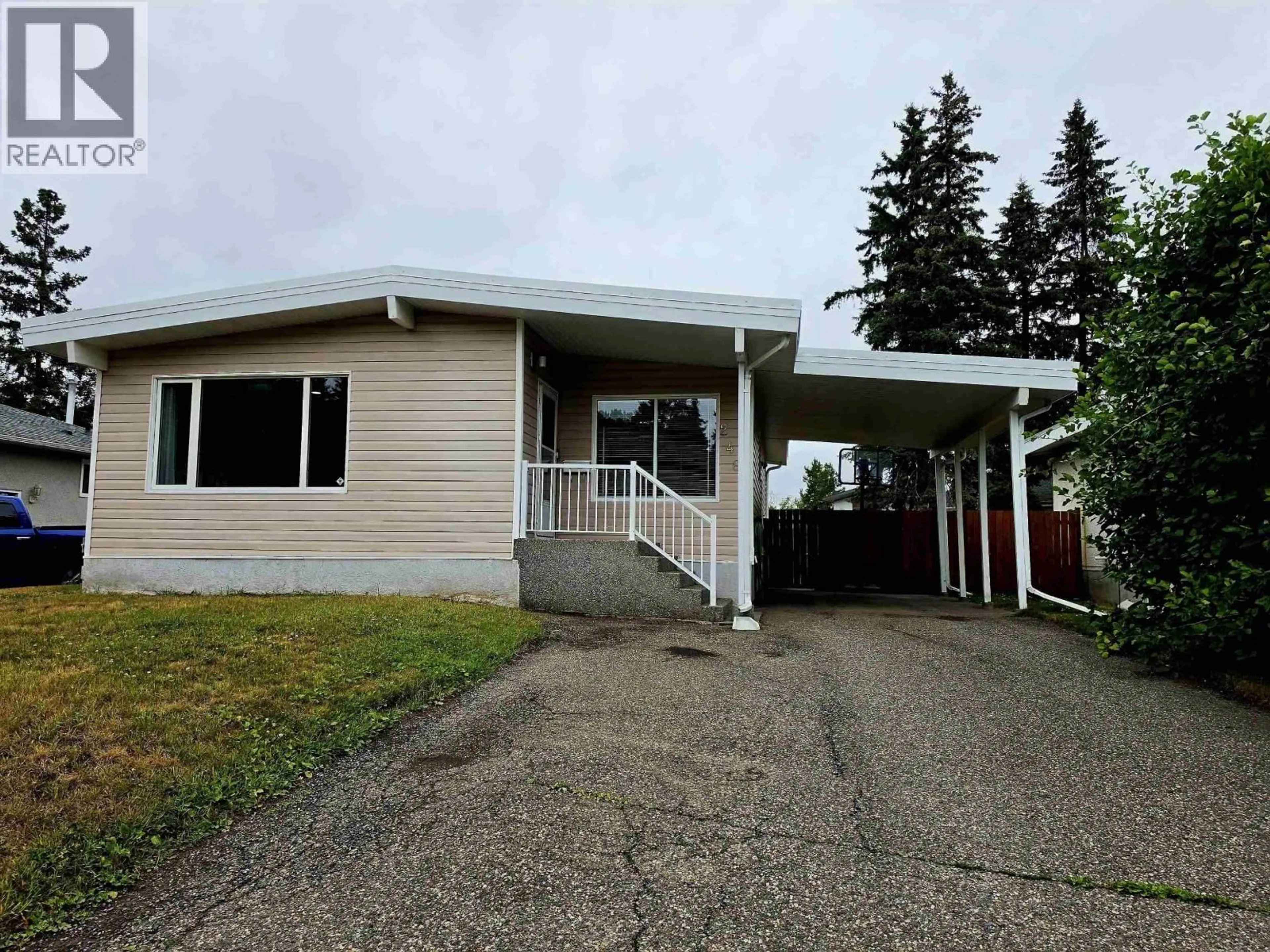 Home with vinyl exterior material, street for 2484 LISGAR CRESCENT, Prince George British Columbia V2N1C5