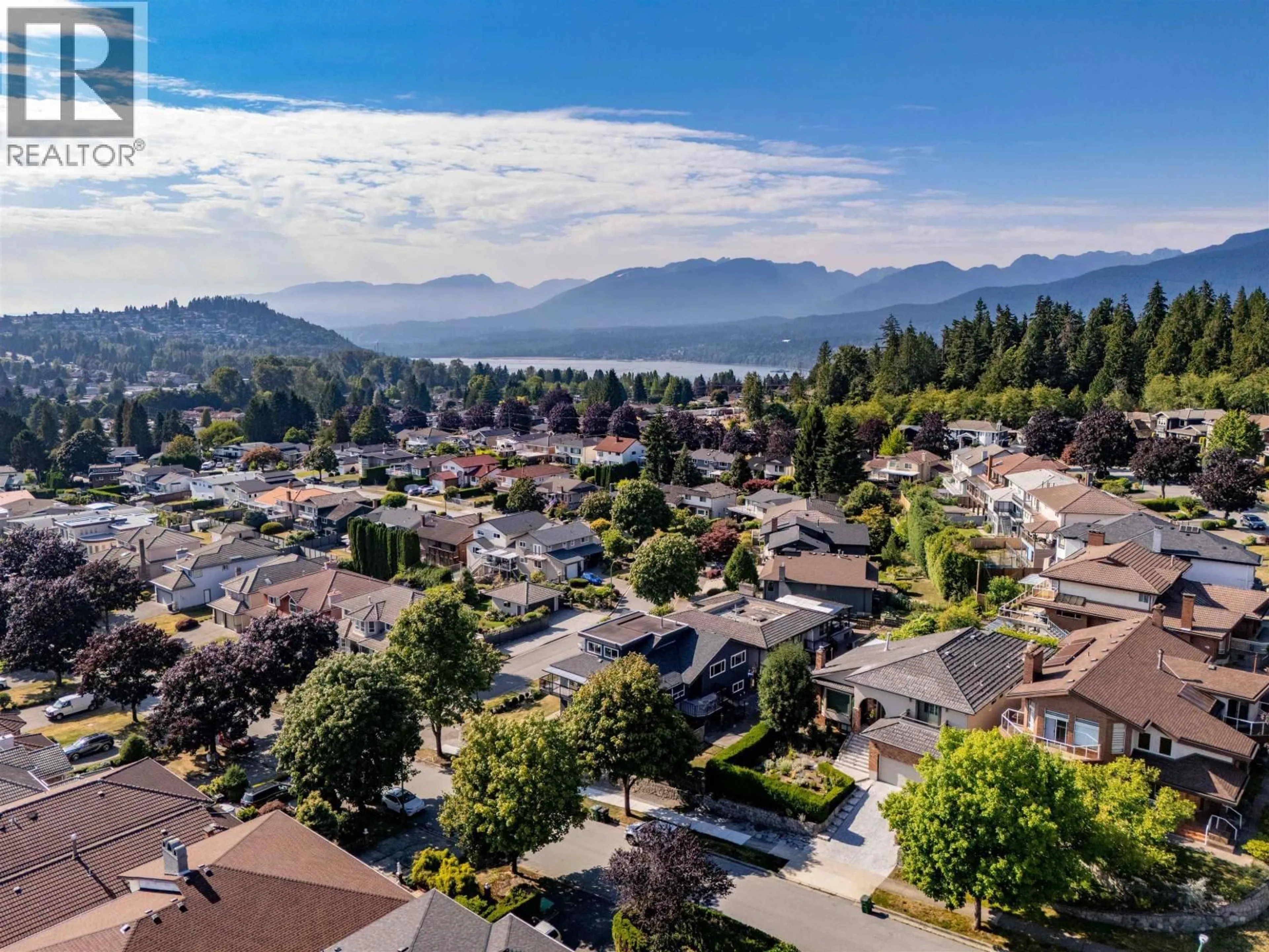 A pic from outside/outdoor area/front of a property/back of a property/a pic from drone, mountain view for 7347 QUEENSTON COURT, Burnaby British Columbia V5A3M5