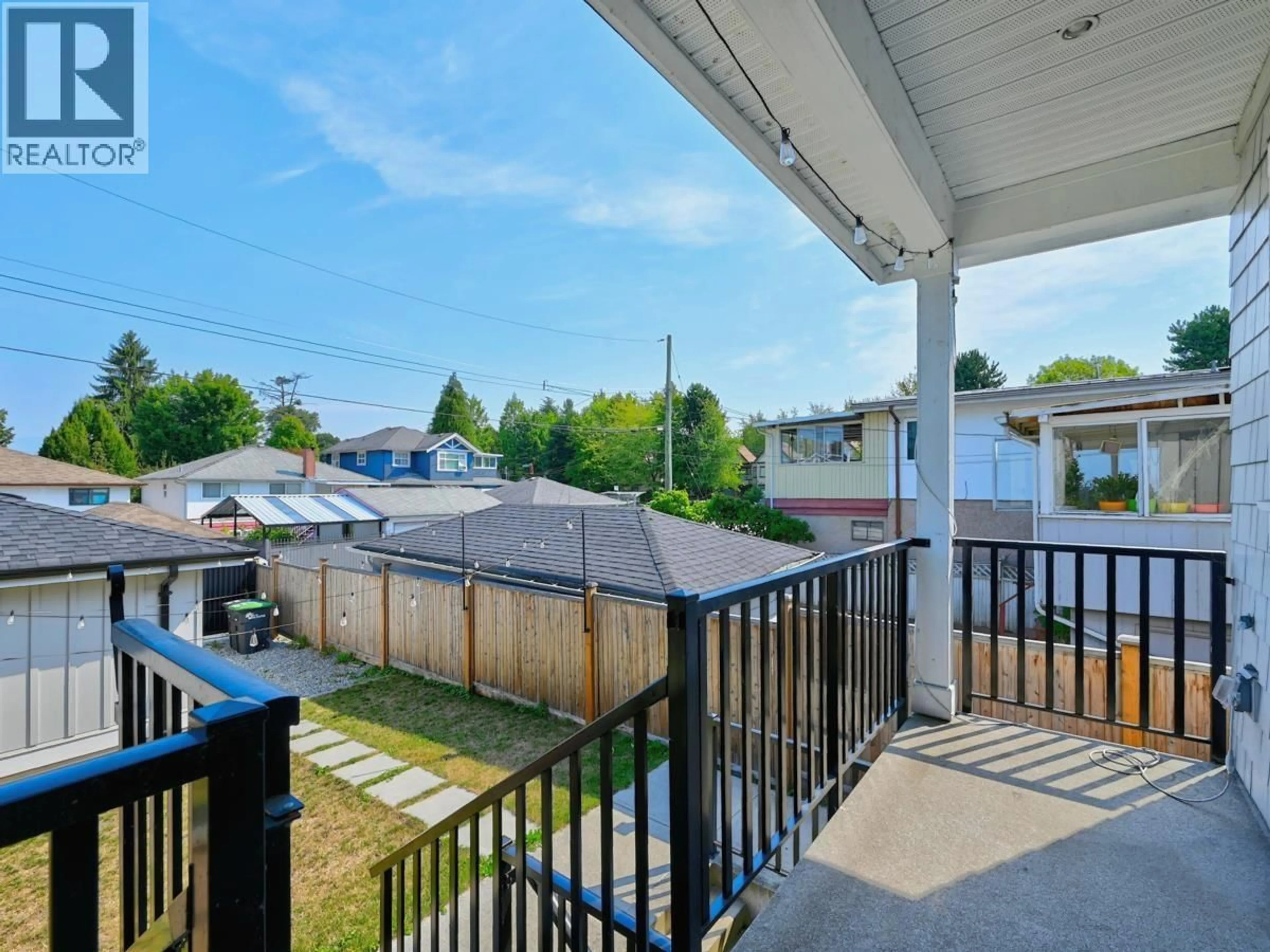Patio, city buildings view from balcony for 2977 42ND AVENUE, Vancouver British Columbia V5R2Y6