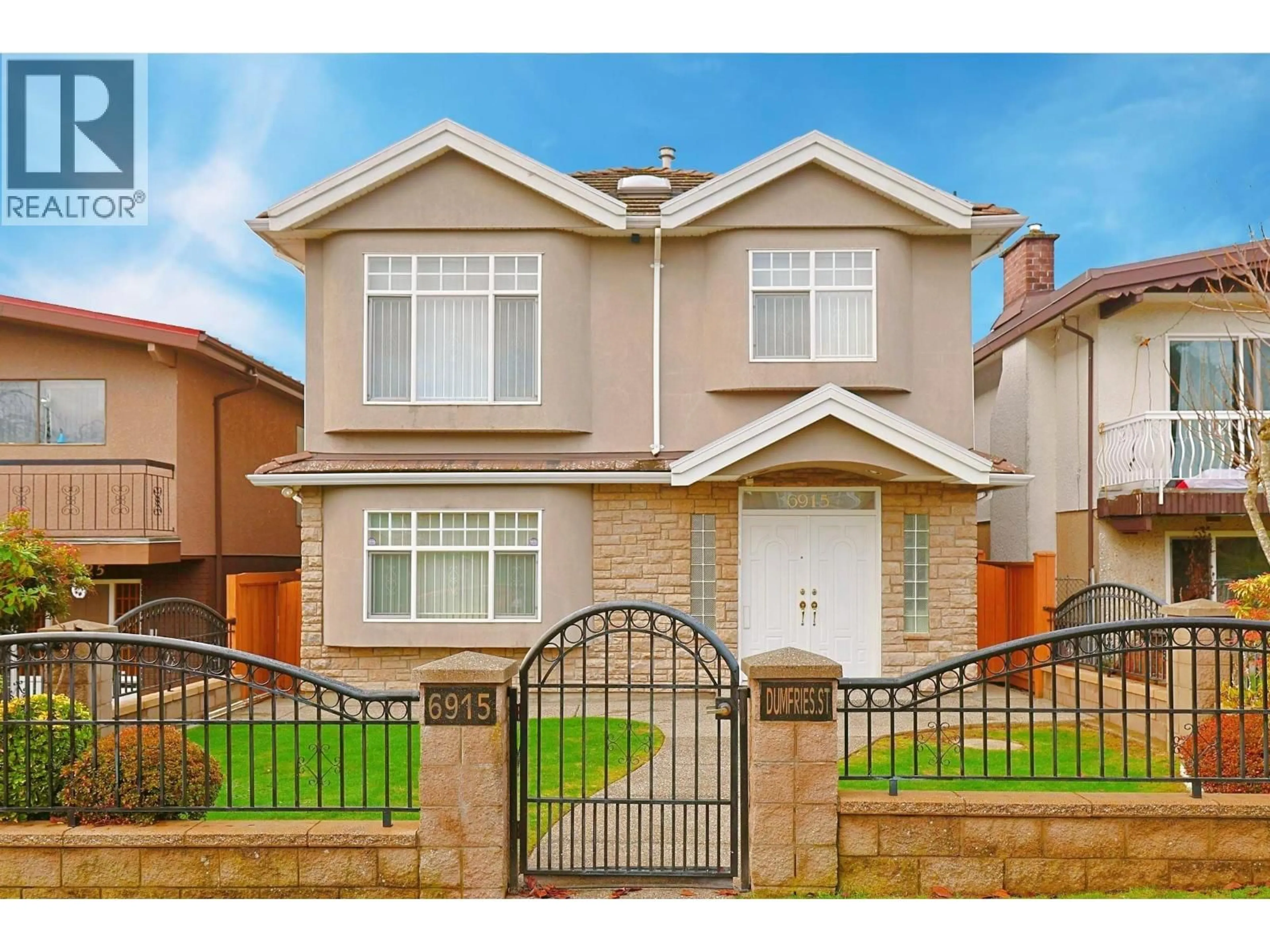Home with brick exterior material, street for 6915 DUMFRIES STREET, Vancouver British Columbia V5P3C1