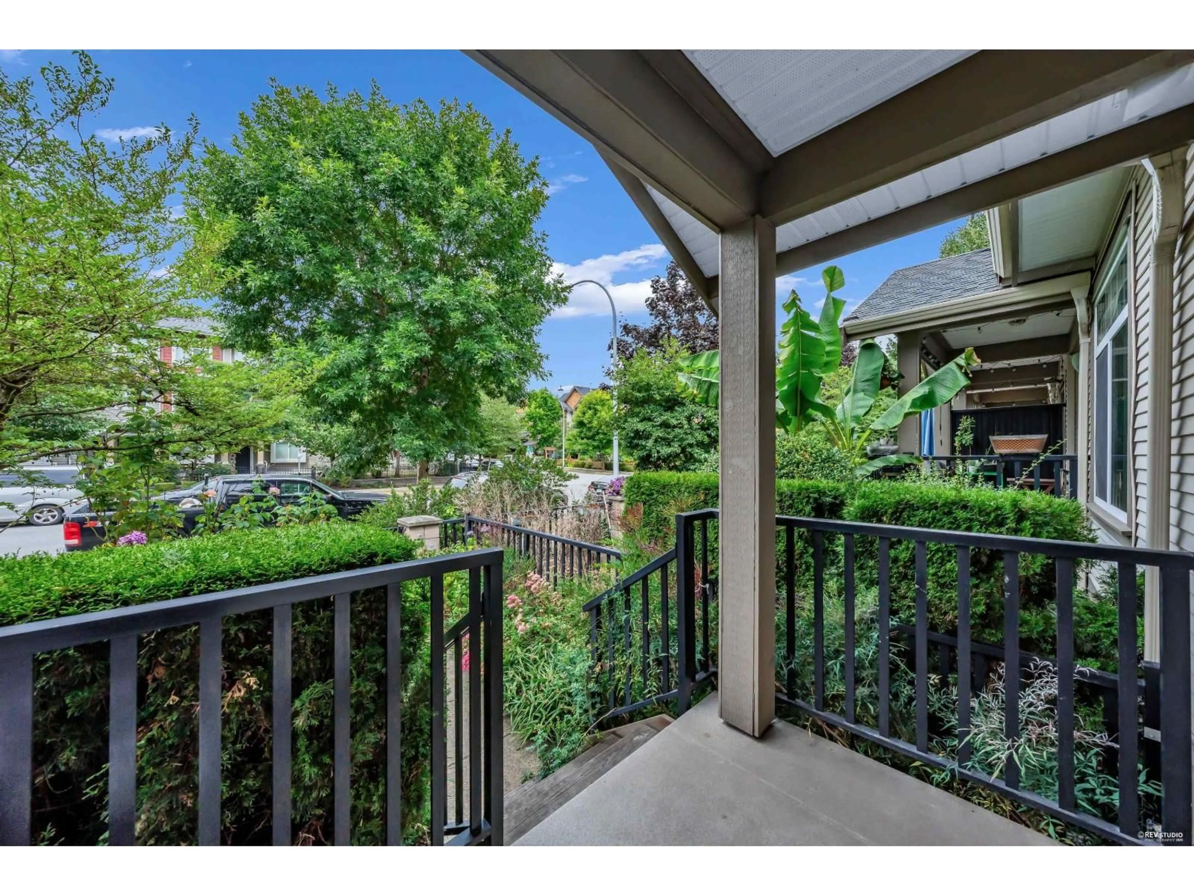 Patio, city buildings view from balcony for 11 - 15933 86A AVENUE, Surrey British Columbia V4N5W2
