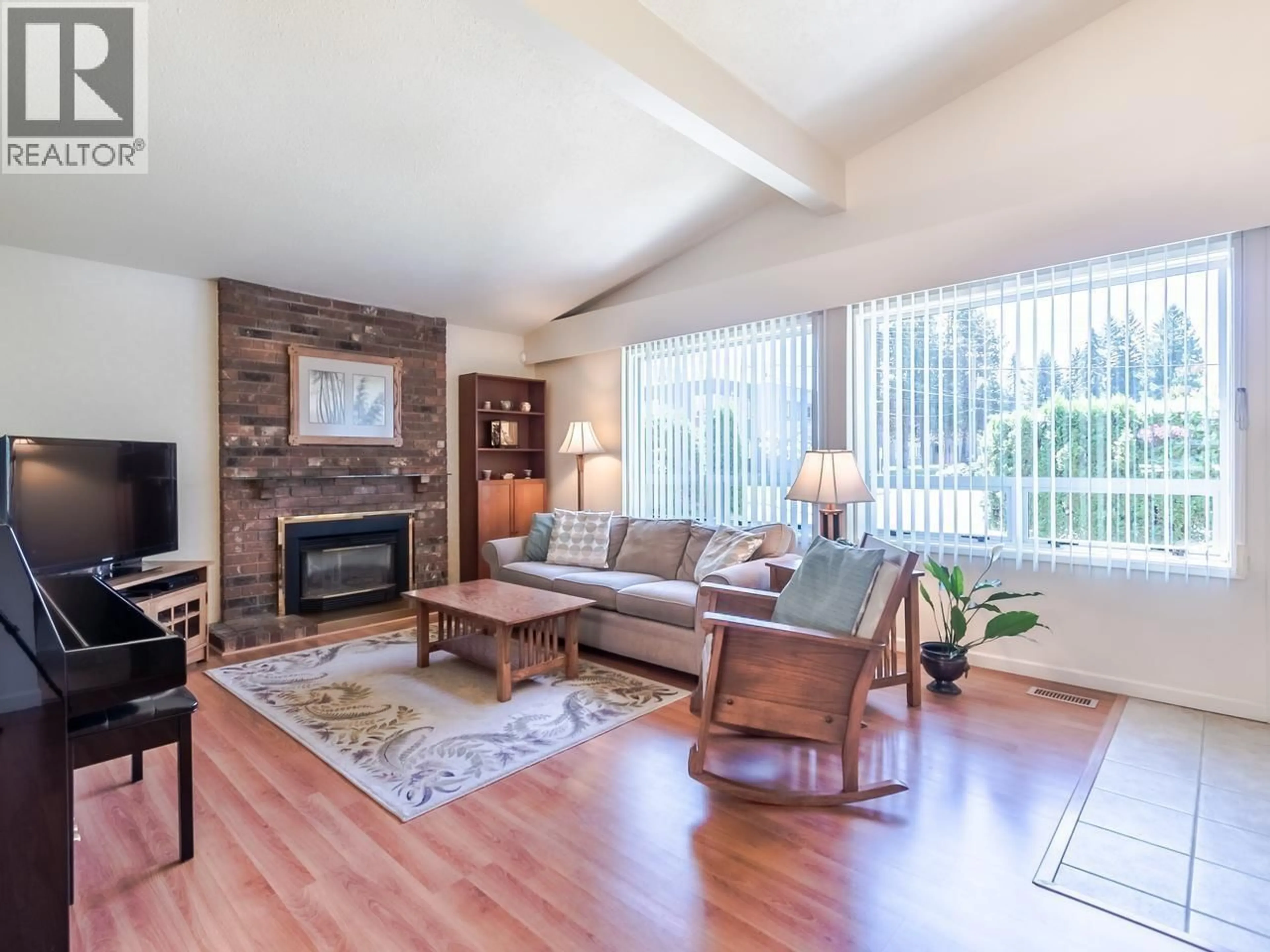 Living room with furniture, wood/laminate floor for 755 EGMONT AVENUE, Coquitlam British Columbia V3J4J7