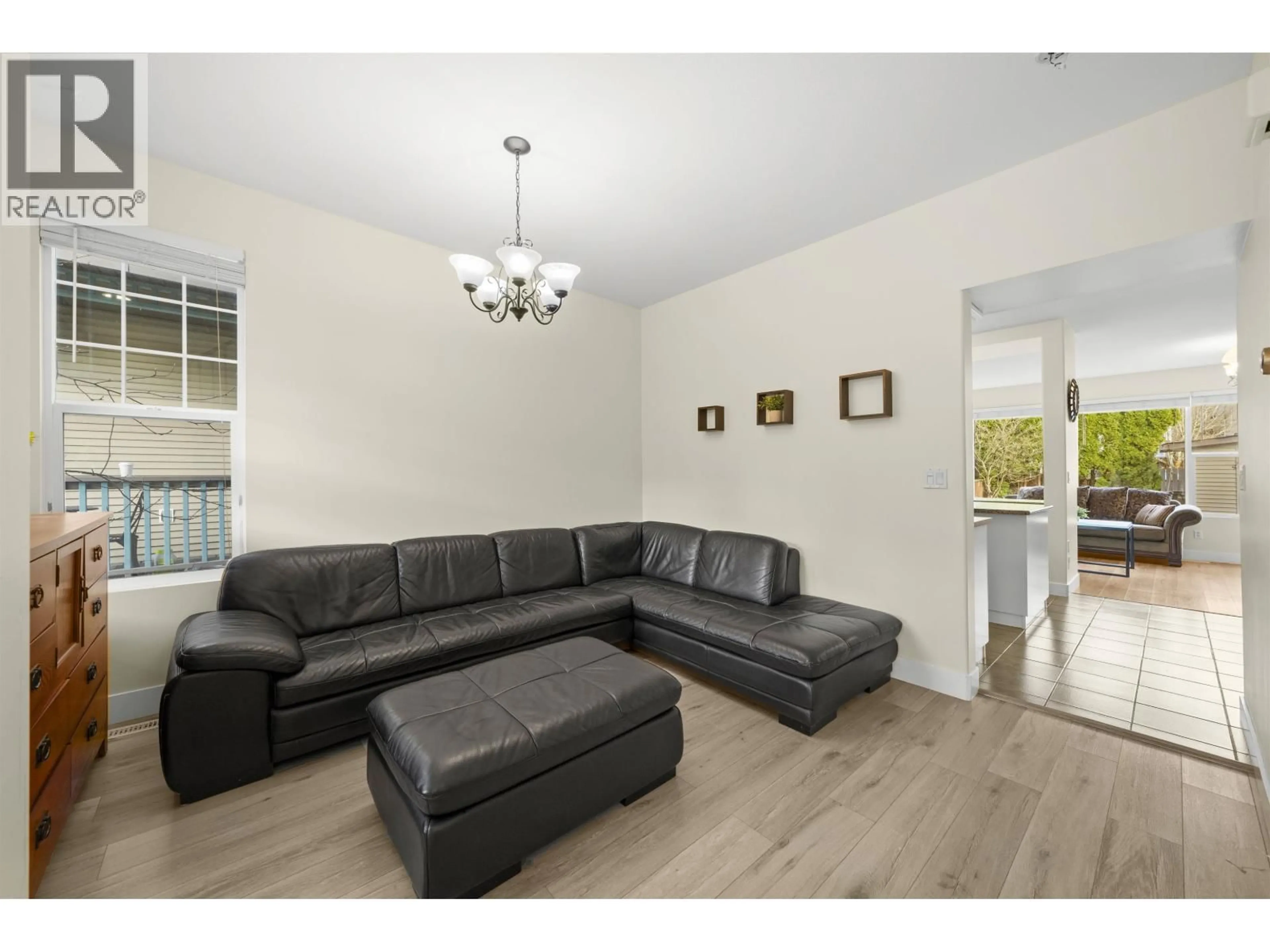 Living room with furniture, wood/laminate floor for 10292 242B STREET, Maple Ridge British Columbia V2W1Y1