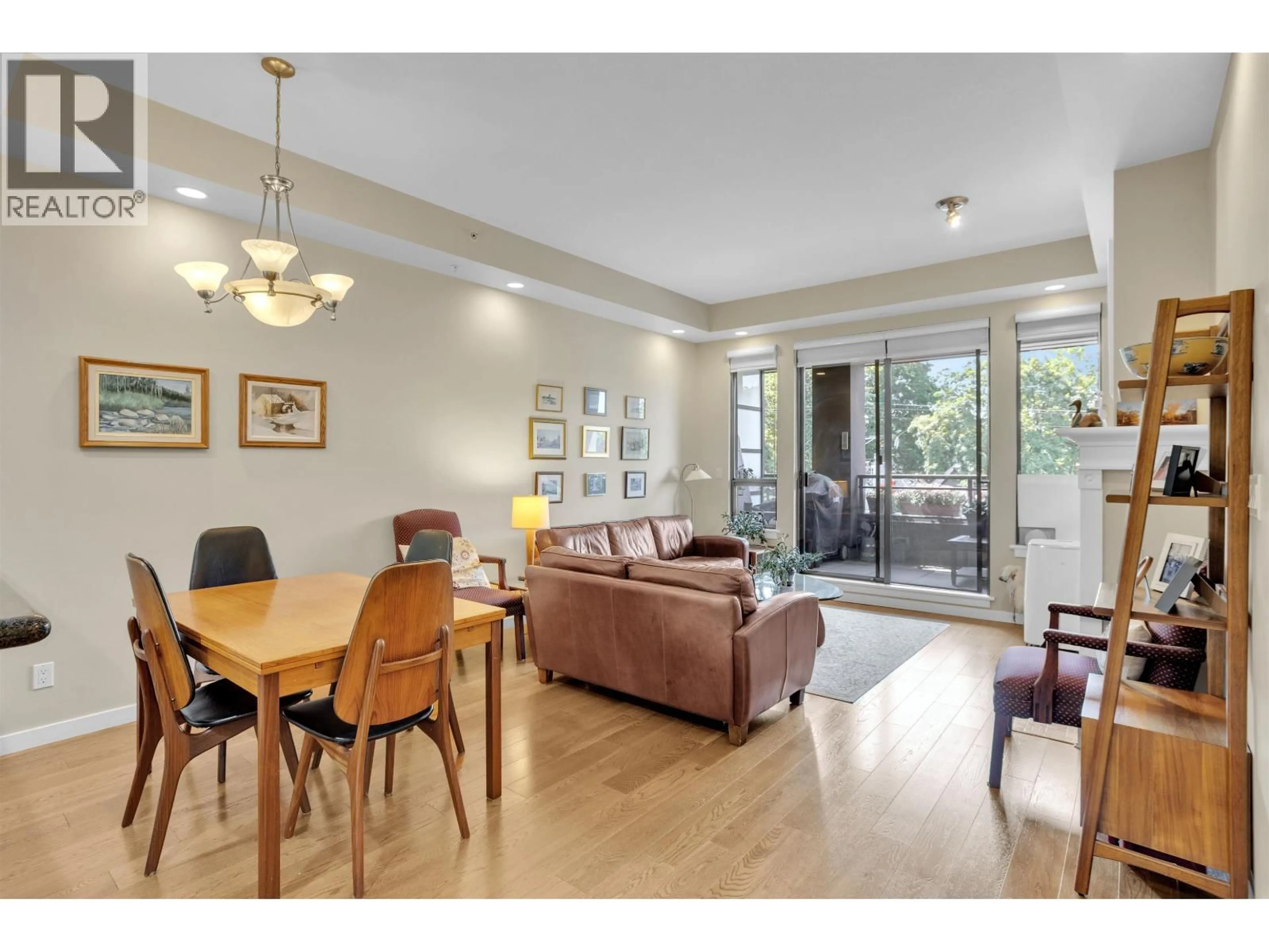 Living room with furniture, wood/laminate floor for 406 - 2226 12TH AVENUE, Vancouver British Columbia V6K2N5