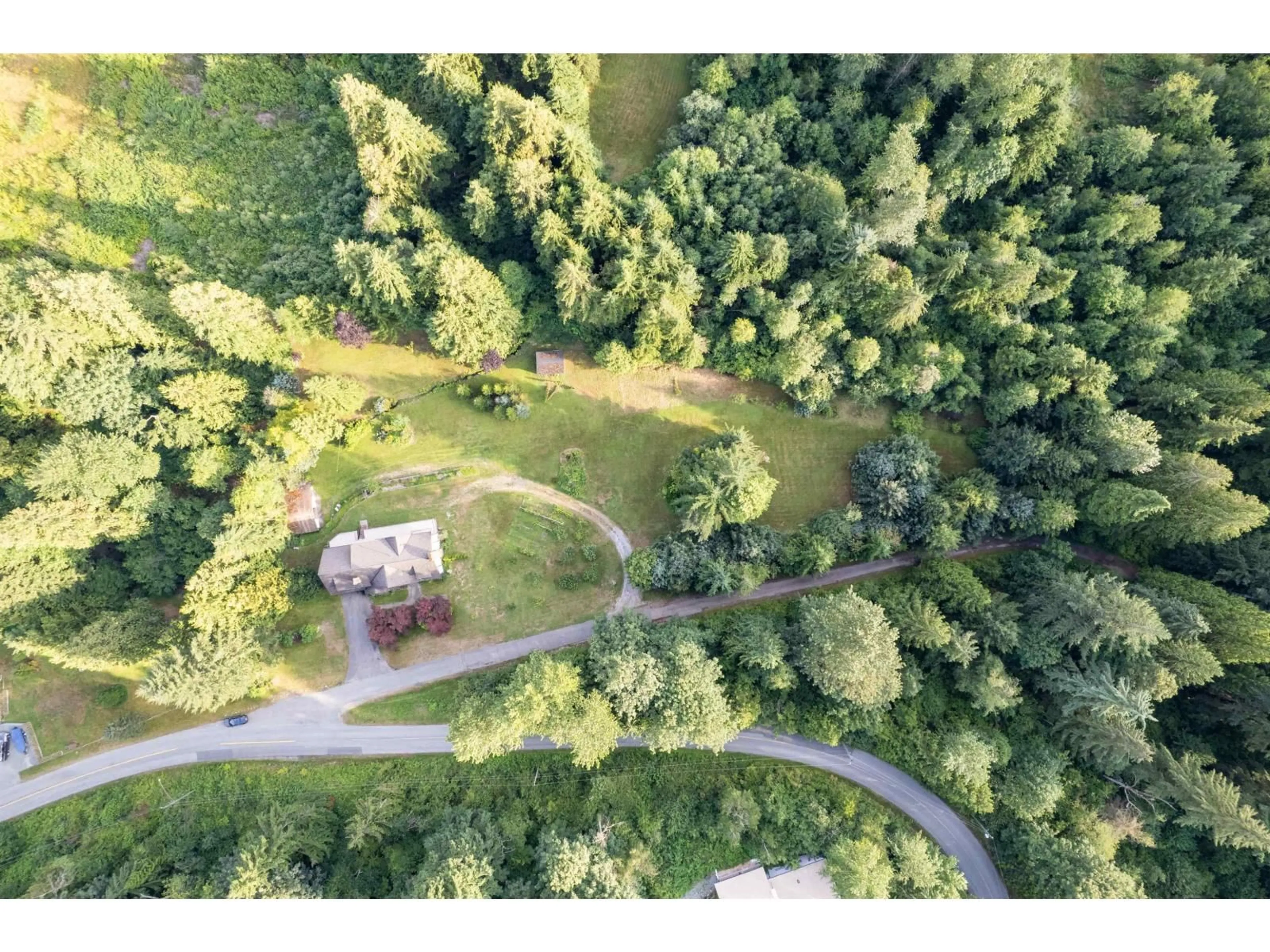 A pic from outside/outdoor area/front of a property/back of a property/a pic from drone, forest/trees view for 33746 DLUGOSH AVENUE, Mission British Columbia V2V6B2