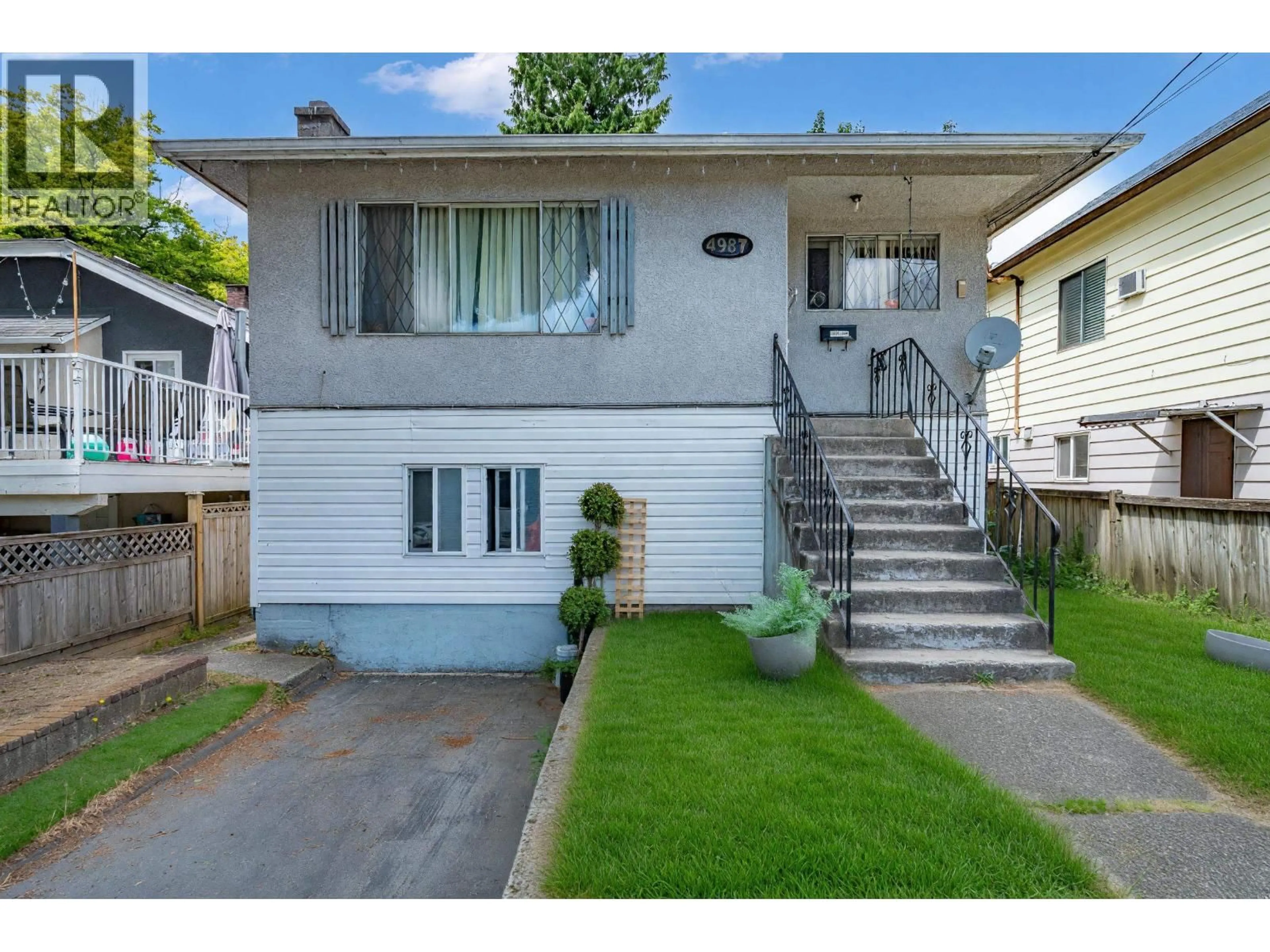 Home with vinyl exterior material, street for 4987 HOY STREET, Vancouver British Columbia V5R4N6