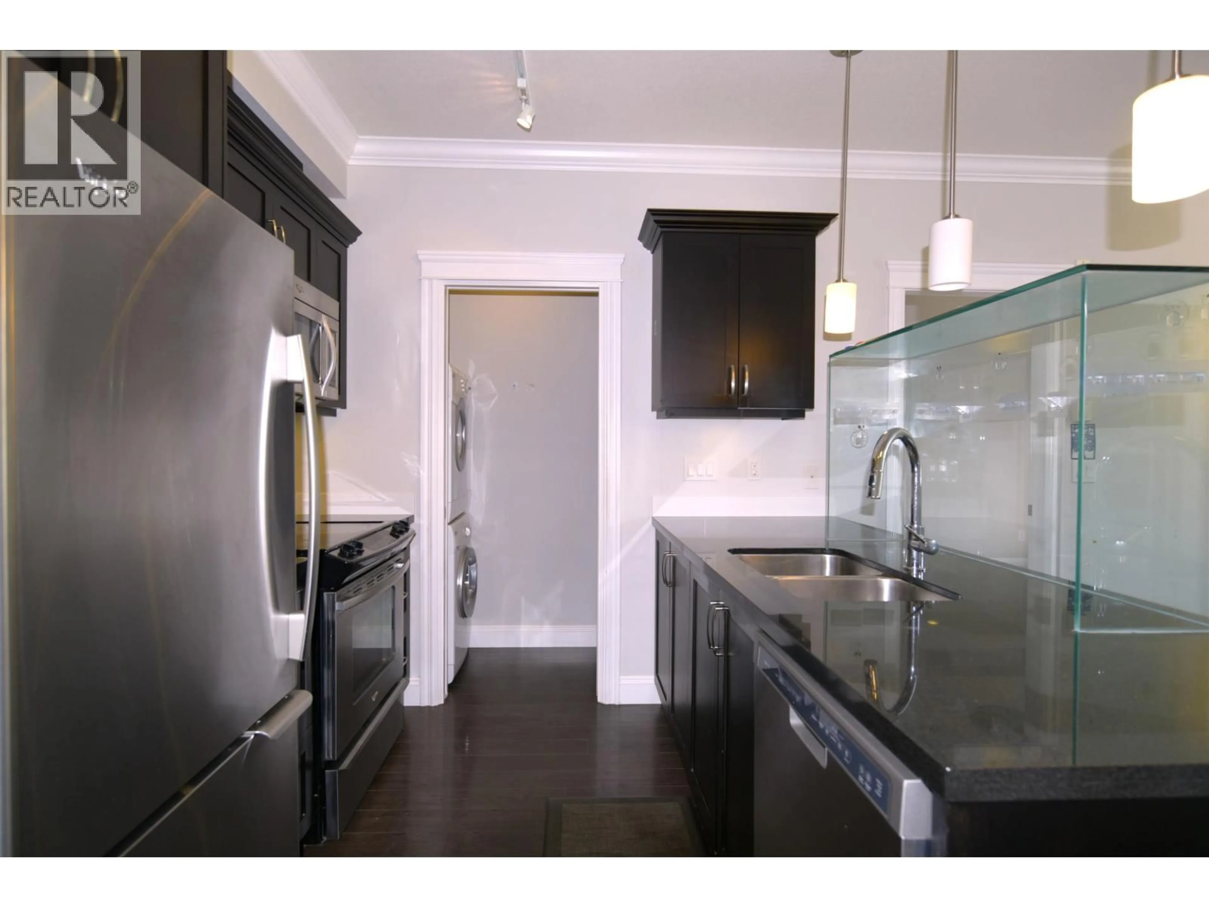 Open concept kitchen, wood/laminate floor for 209 - 11882 226 STREET, Maple Ridge British Columbia V2X9C7