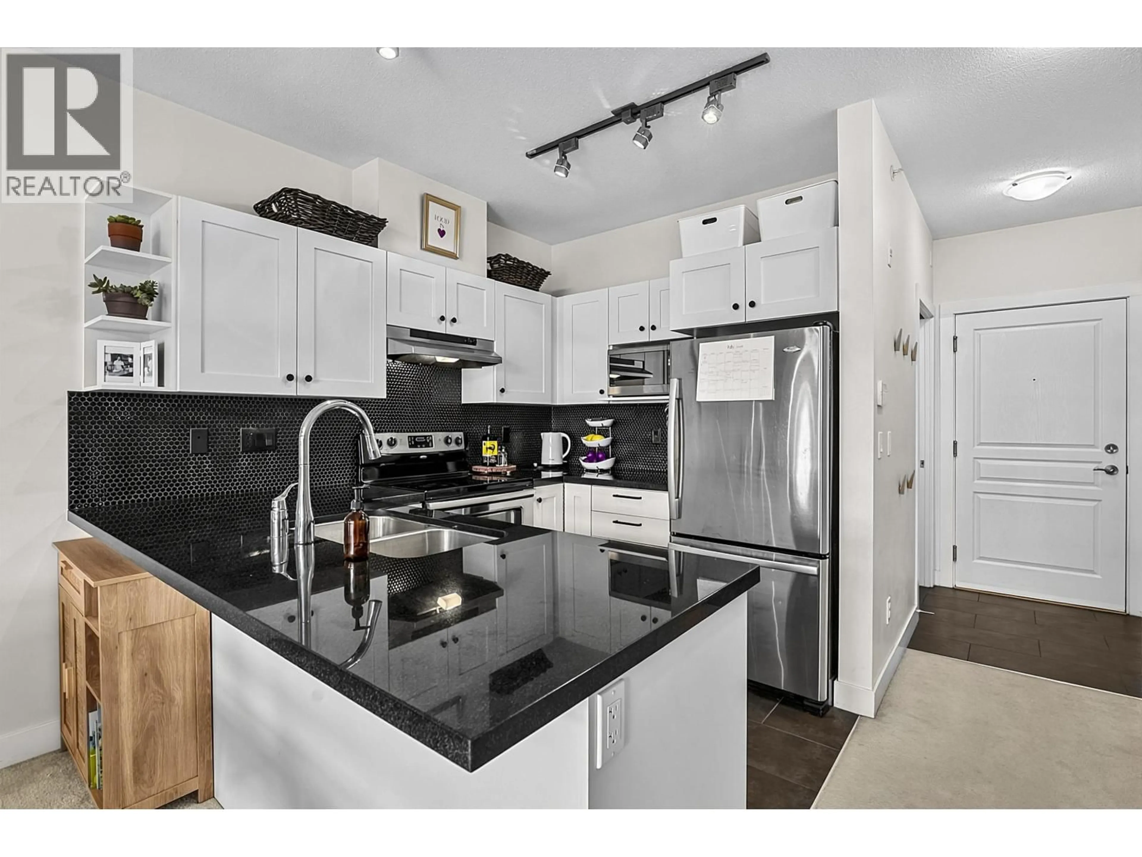 Open concept kitchen, unknown for 417 - 4550 FRASER STREET, Vancouver British Columbia V5V4G8