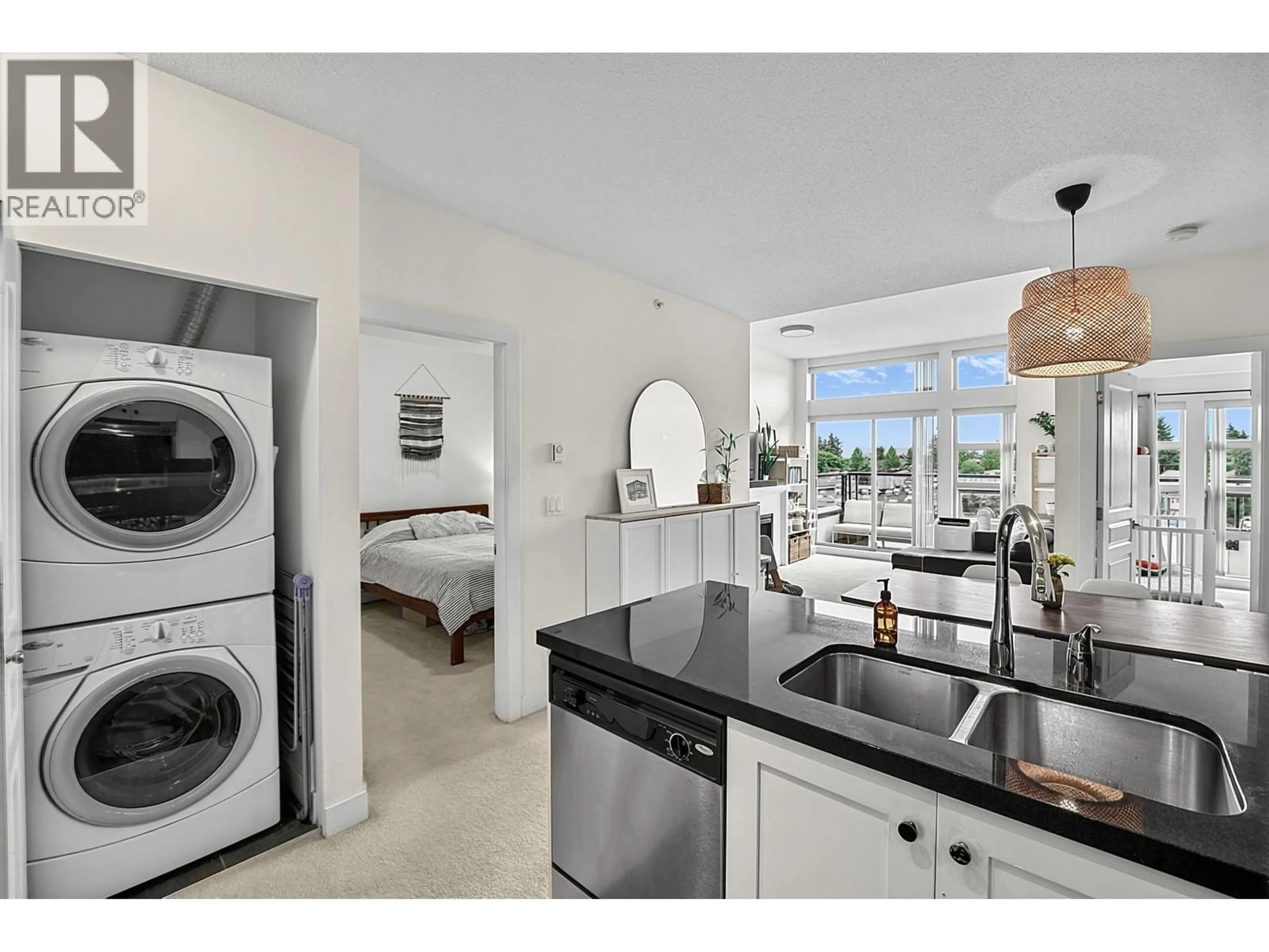Kitchen with laundary machines, ceramic/tile floor for 417 - 4550 FRASER STREET, Vancouver British Columbia V5V4G8