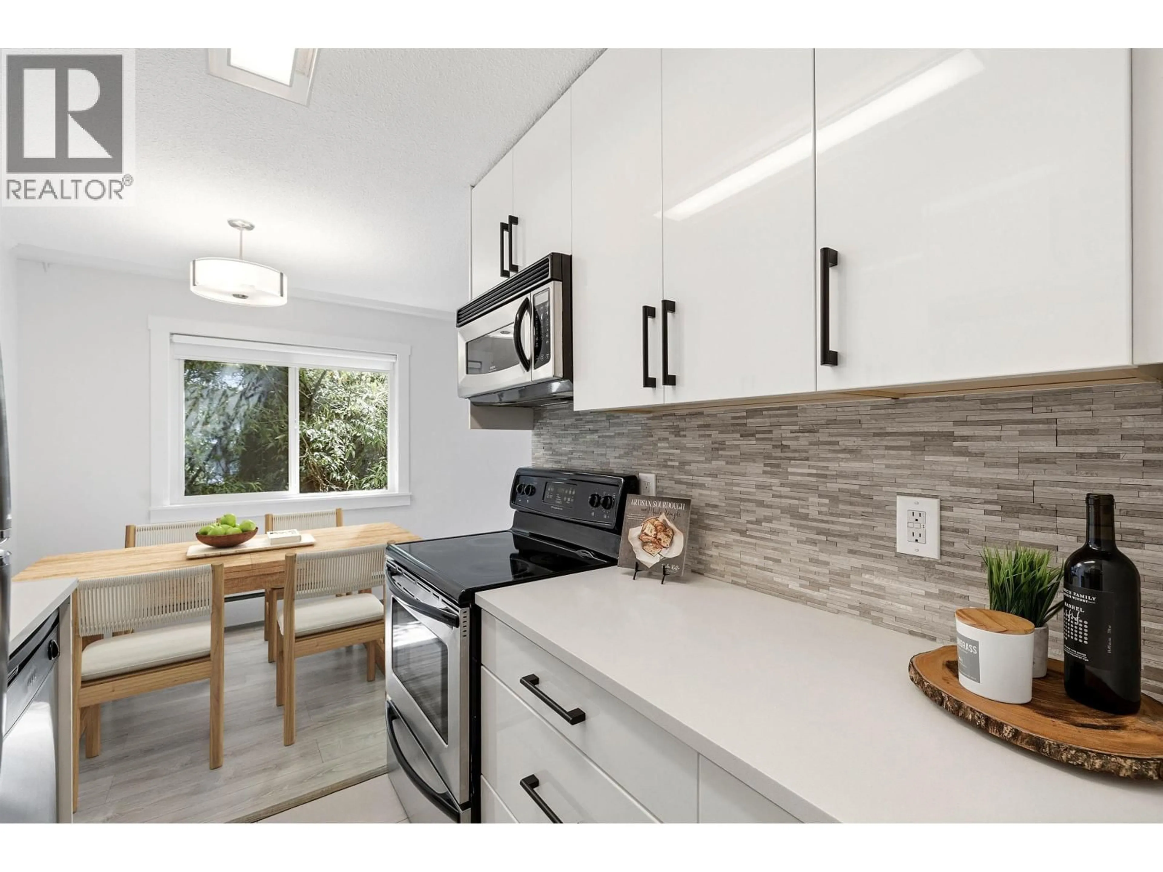Open concept kitchen, unknown for 112 - 211 3RD STREET, North Vancouver British Columbia V7M1E9