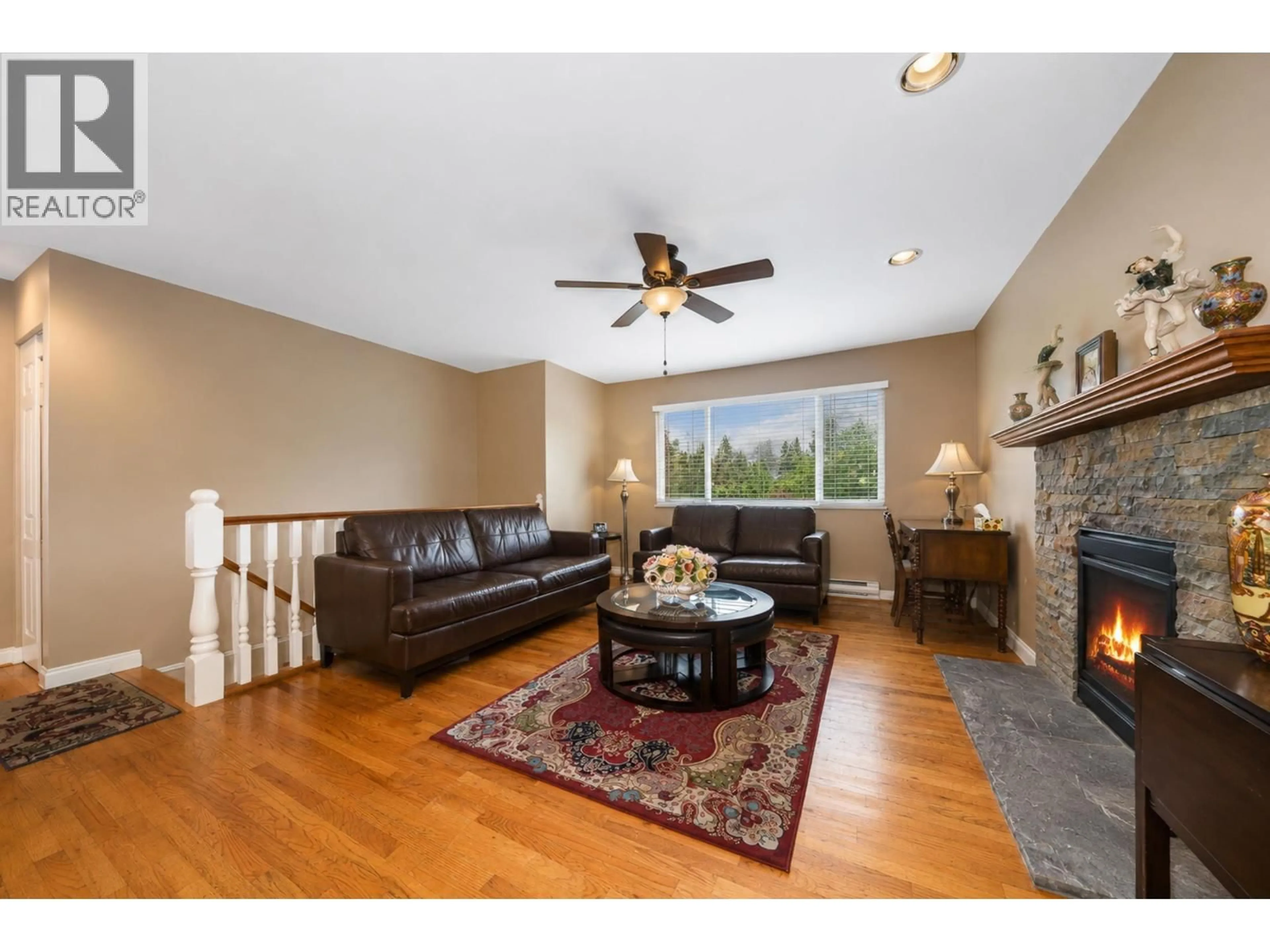 Living room with furniture, wood/laminate floor for 772 APPLEYARD COURT, Port Moody British Columbia V3H3X1