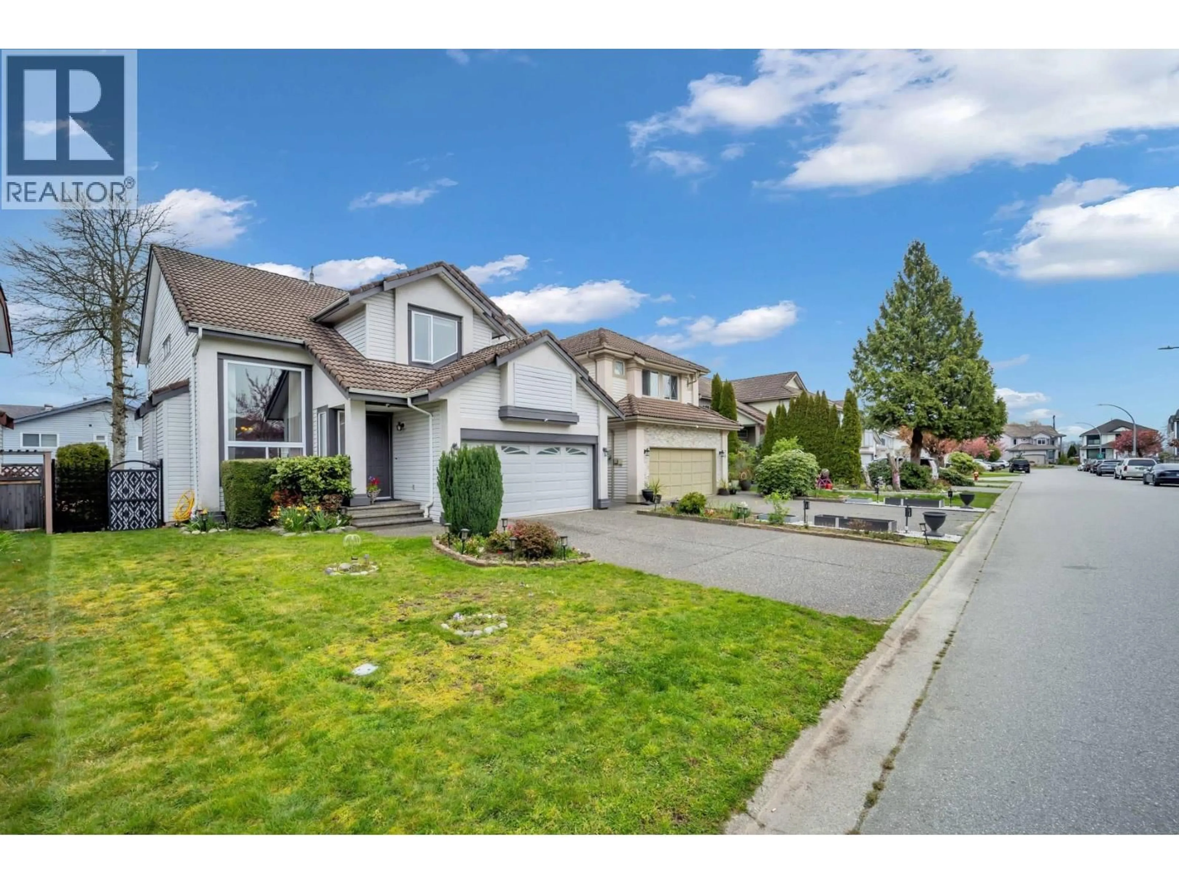 A pic from outside/outdoor area/front of a property/back of a property/a pic from drone, street for 707 OMINECA AVENUE, Port Coquitlam British Columbia V3B7N9