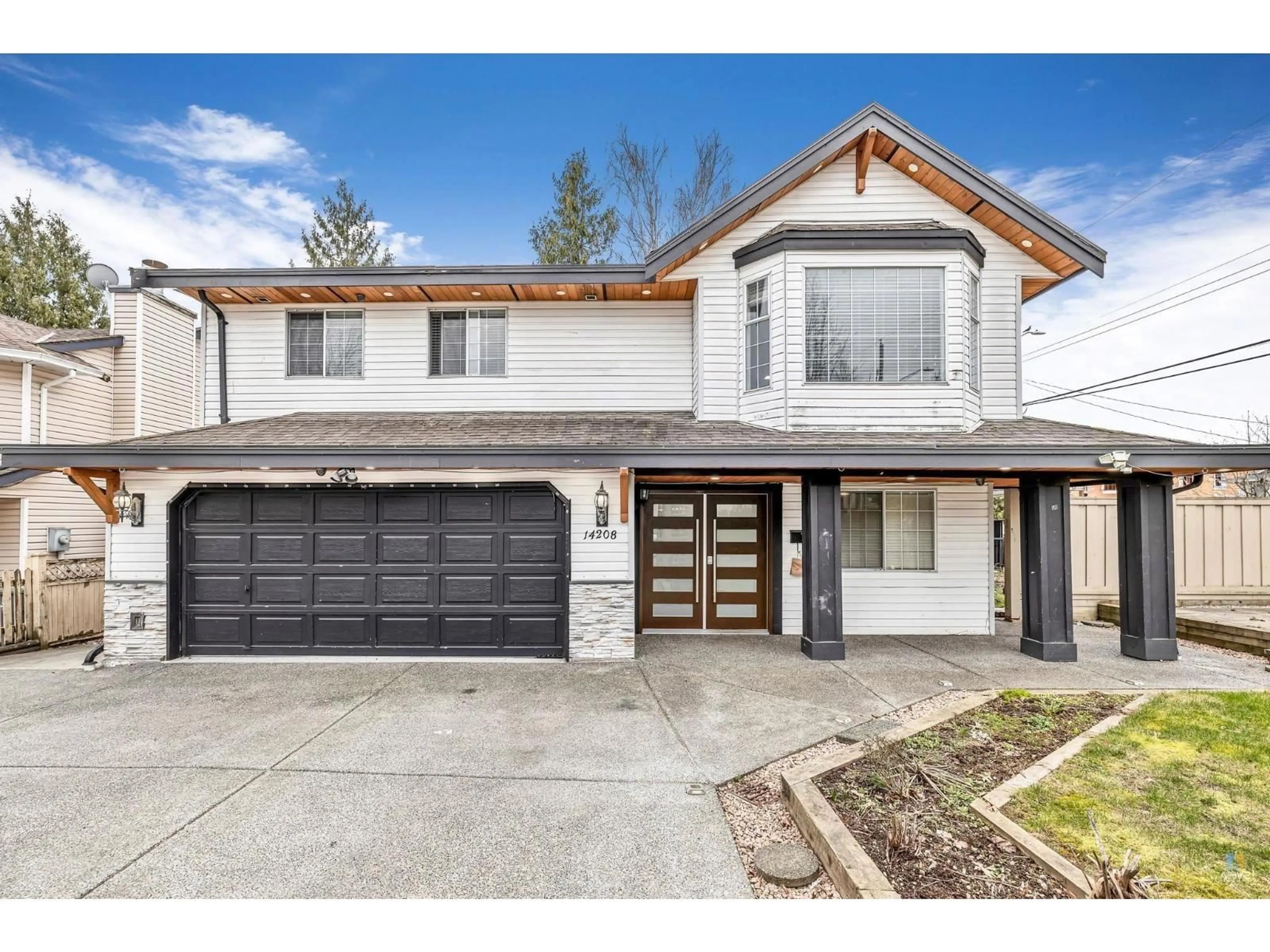 Home with vinyl exterior material, street for 14208 67 AVENUE, Surrey British Columbia V3W0P5