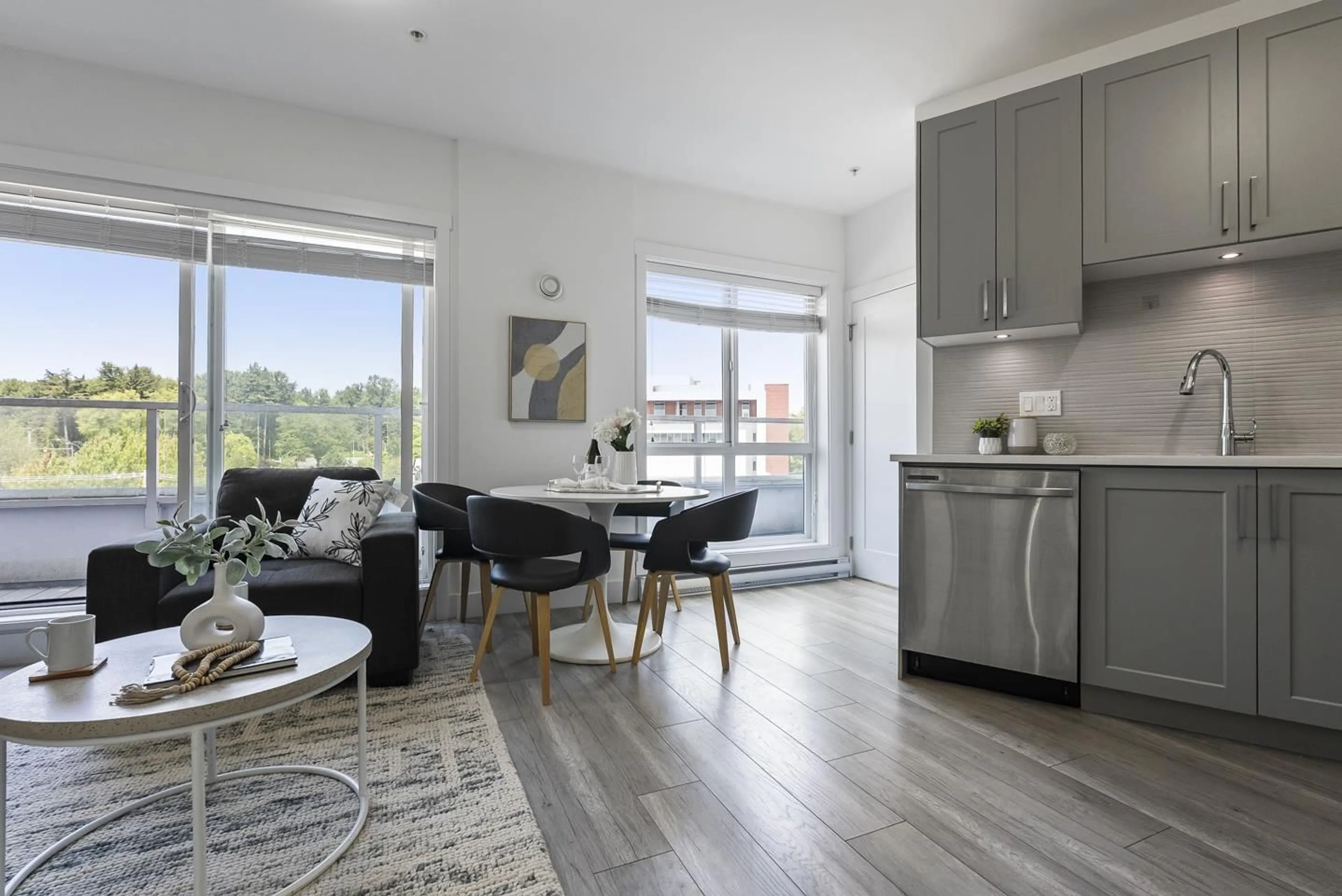 Open concept kitchen, wood/laminate floor for 505 - 13978 FRASER HIGHWAY, Surrey British Columbia V3T0P2