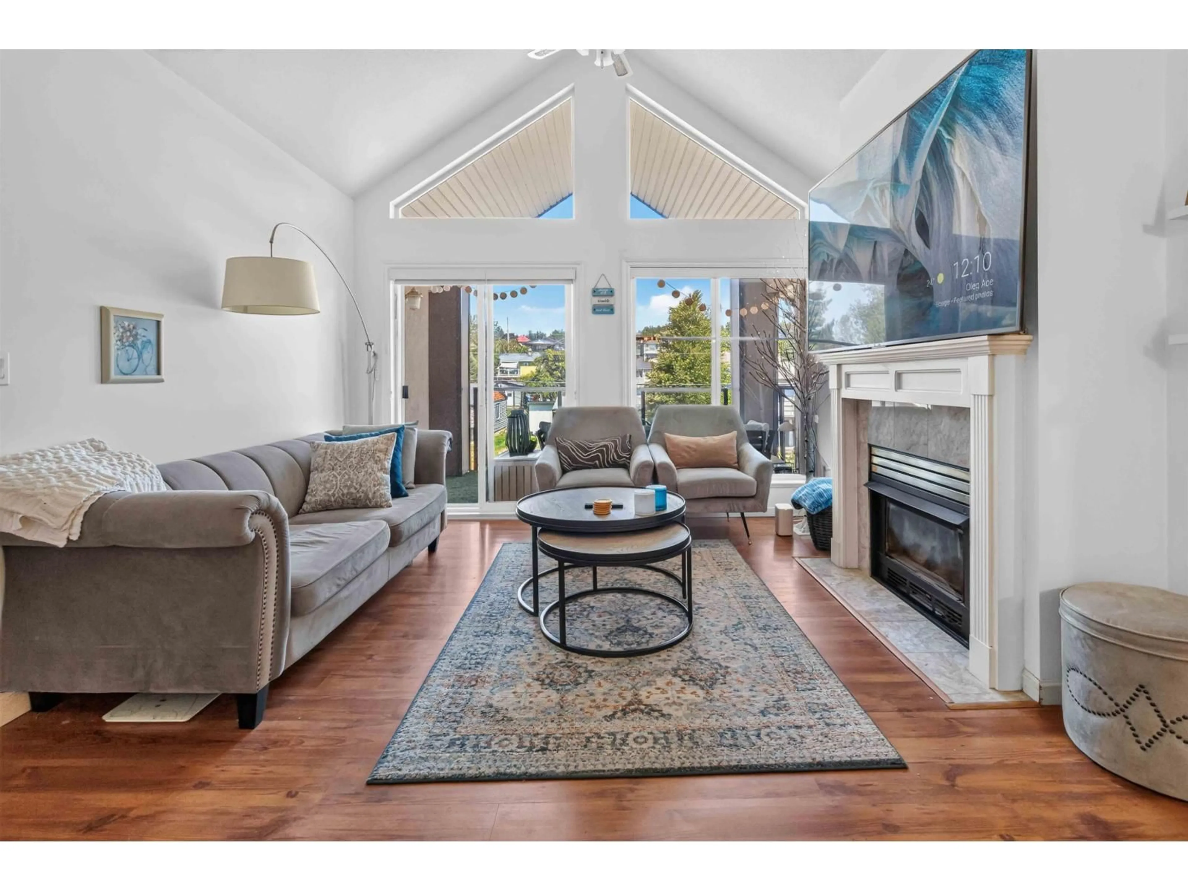 Living room with furniture, wood/laminate floor for 316 - 33150 4TH AVENUE, Mission British Columbia V2V7A3
