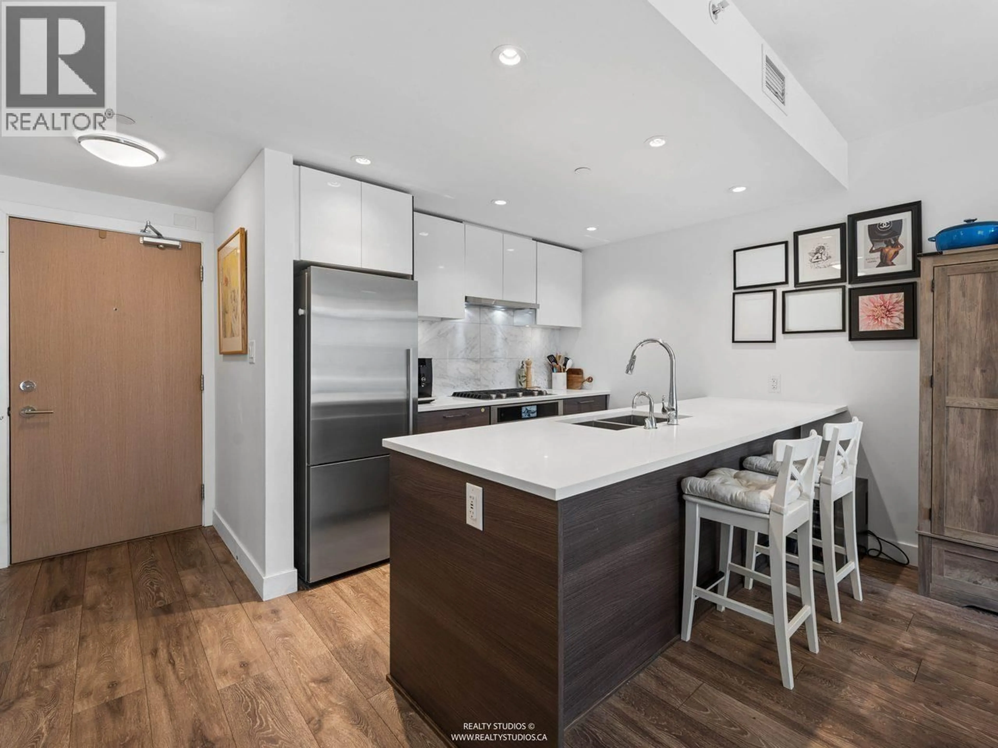 Open concept kitchen, unknown for 205 - 8538 RIVER DISTRICT CROSSING, Vancouver British Columbia V5S0C9