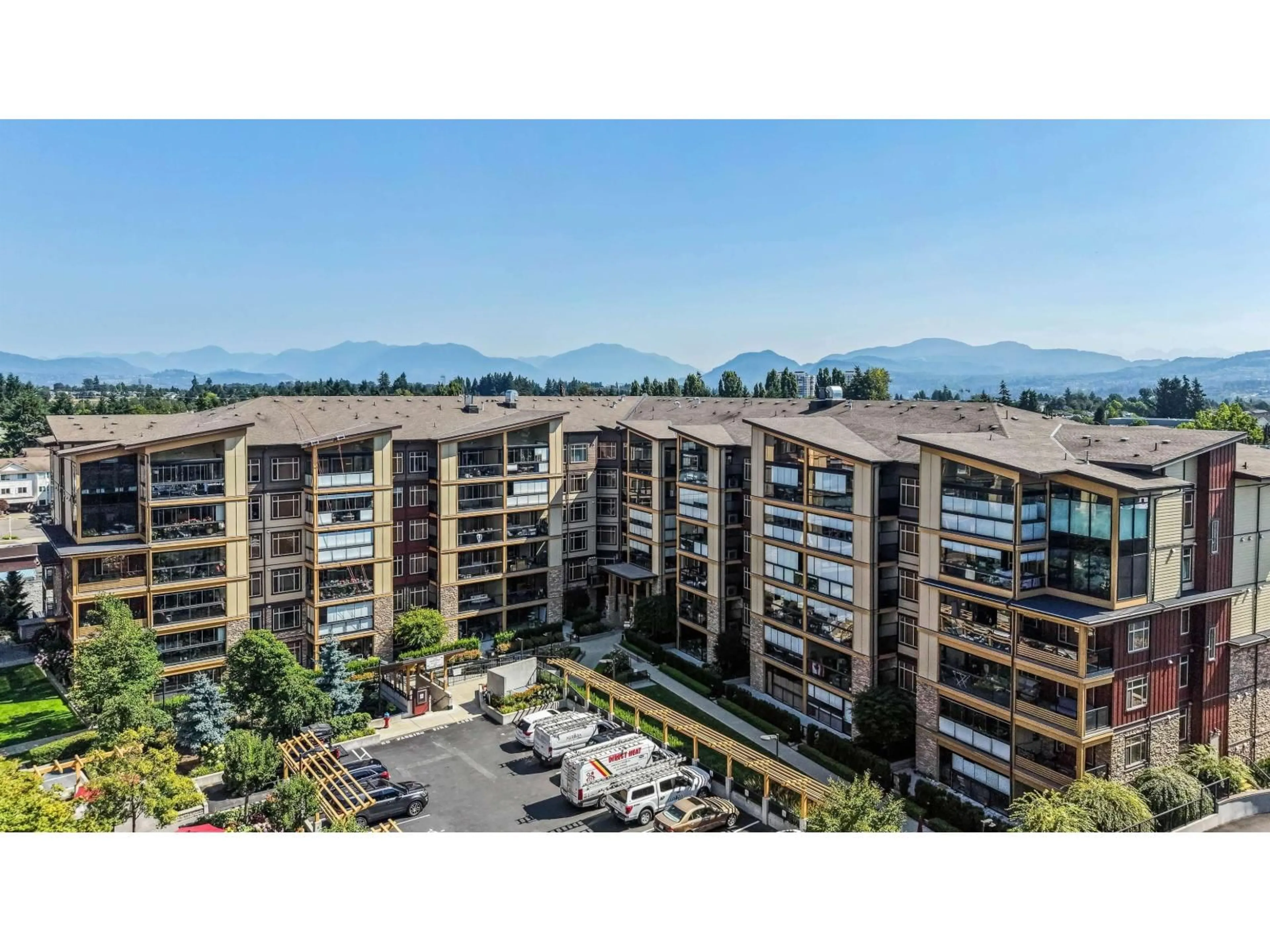 A pic from outside/outdoor area/front of a property/back of a property/a pic from drone, mountain view for 104 - 32445 SIMON AVENUE, Abbotsford British Columbia V2T3R7