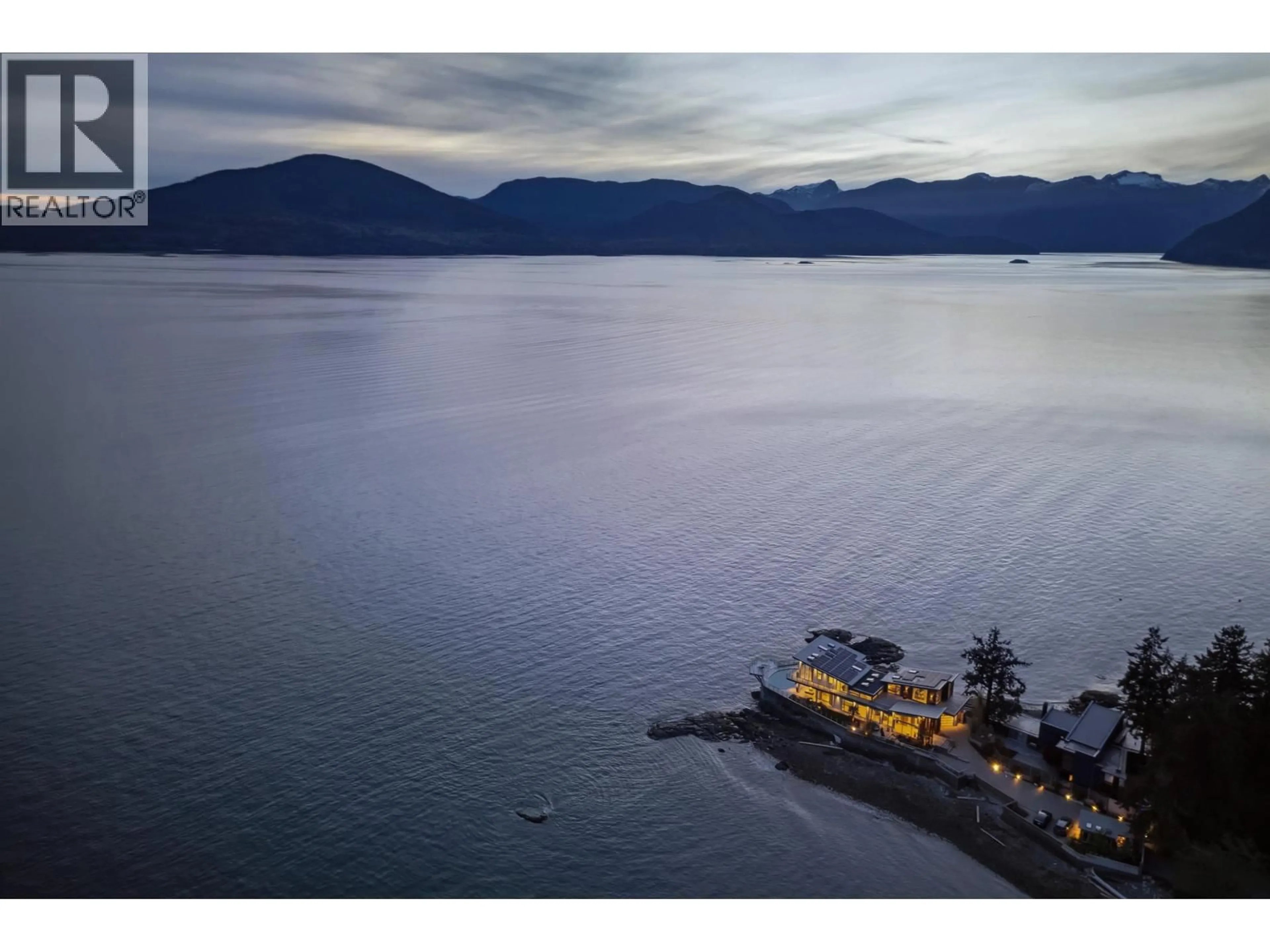 A pic from outside/outdoor area/front of a property/back of a property/a pic from drone, water/lake/river/ocean view for 15 BRUNSWICK BEACH ROAD, Lions Bay British Columbia V0N2E0