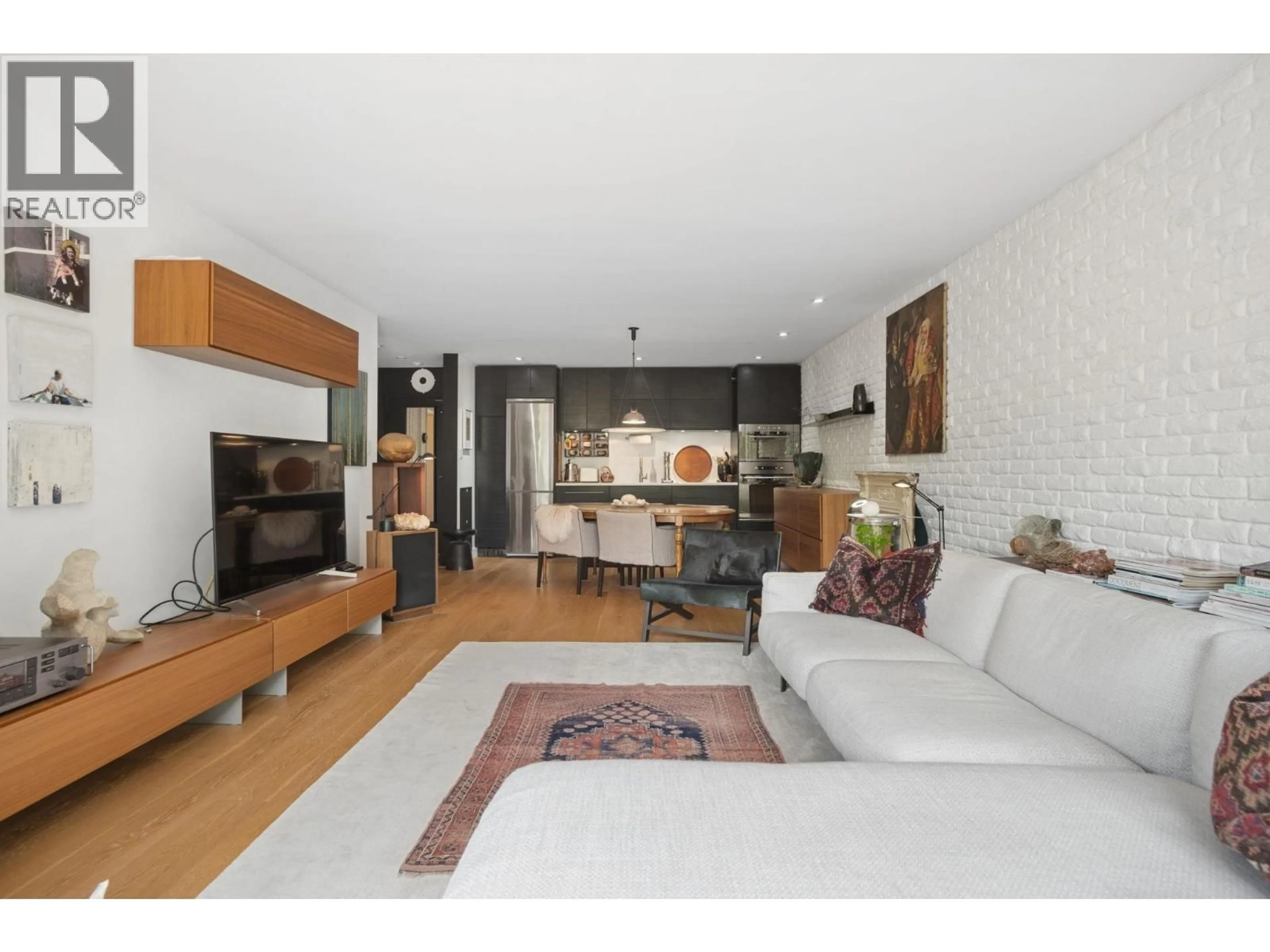 Living room with furniture, unknown for 205 - 3264 OAK STREET, Vancouver British Columbia V6H2L3