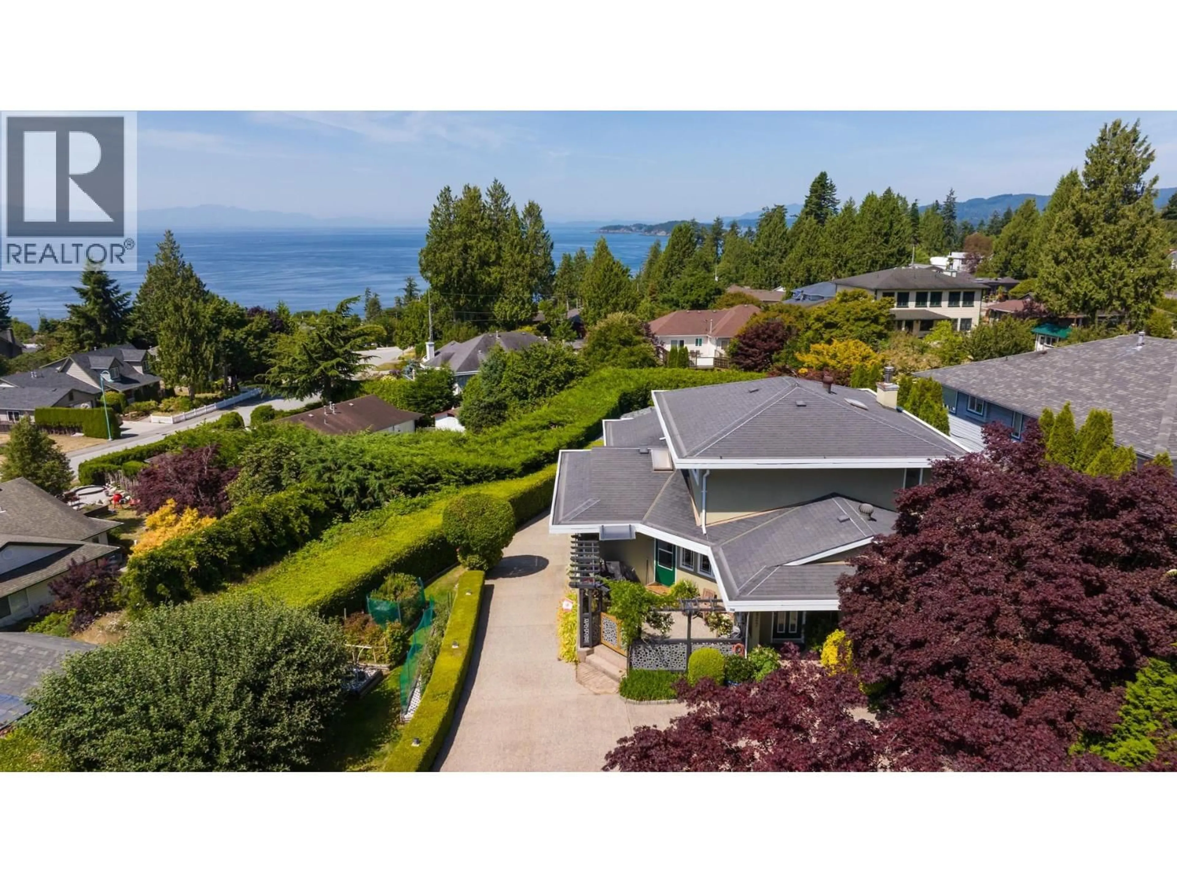 A pic from outside/outdoor area/front of a property/back of a property/a pic from drone, water/lake/river/ocean view for 4827 BLUEGROUSE DRIVE, Sechelt British Columbia V7Z0E9
