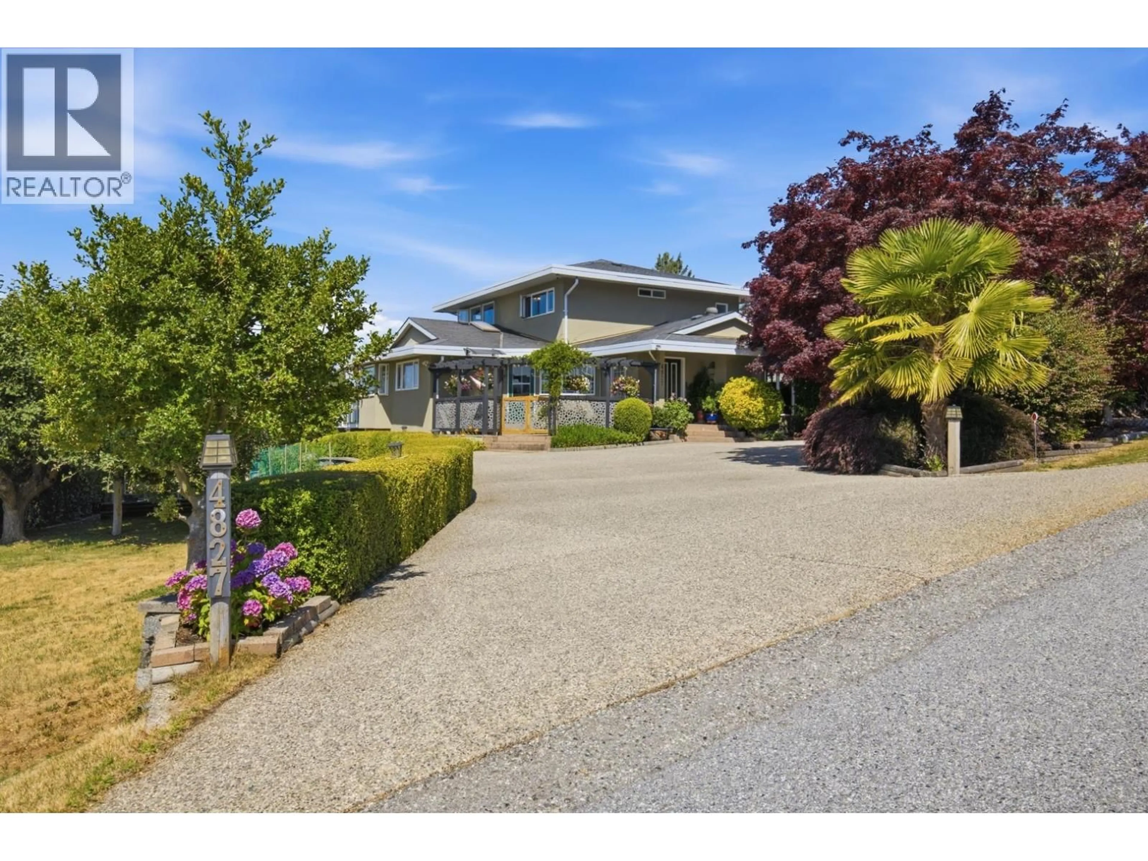 A pic from outside/outdoor area/front of a property/back of a property/a pic from drone, street for 4827 BLUEGROUSE DRIVE, Sechelt British Columbia V7Z0E9