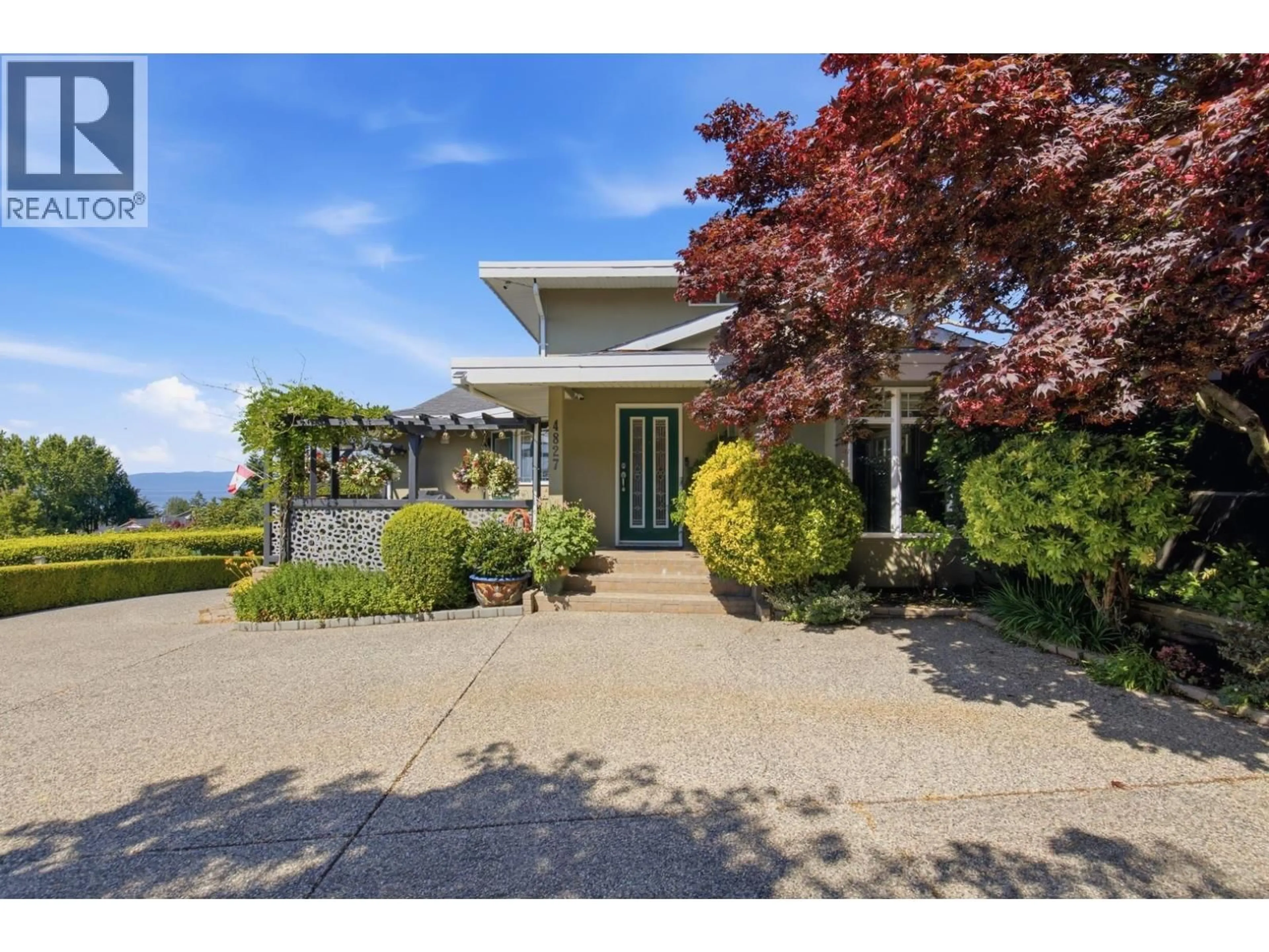 A pic from outside/outdoor area/front of a property/back of a property/a pic from drone, street for 4827 BLUEGROUSE DRIVE, Sechelt British Columbia V7Z0E9