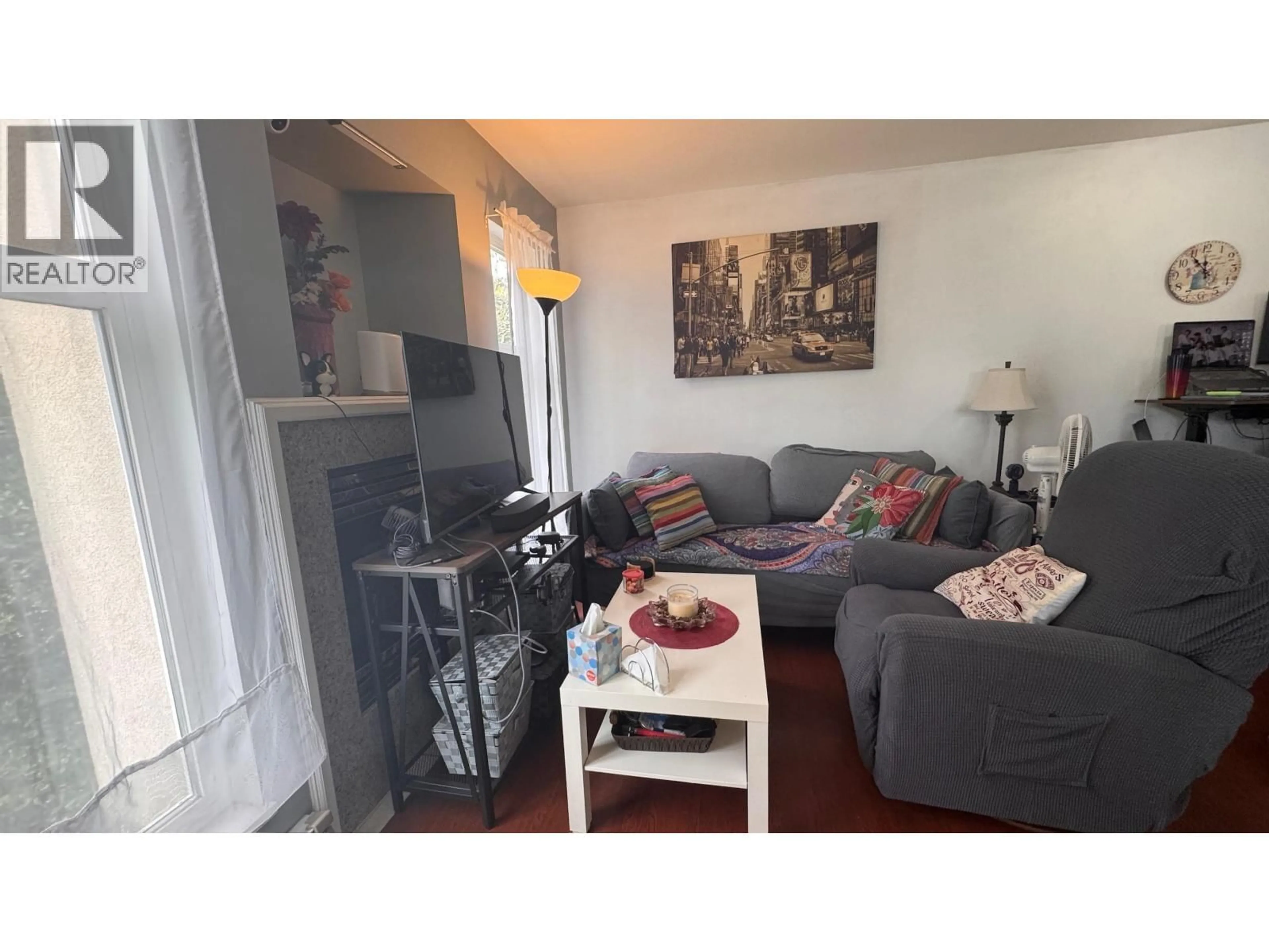 Living room with furniture, wood/laminate floor for 301 - 1099 71ST AVENUE, Vancouver British Columbia V6P6Y5