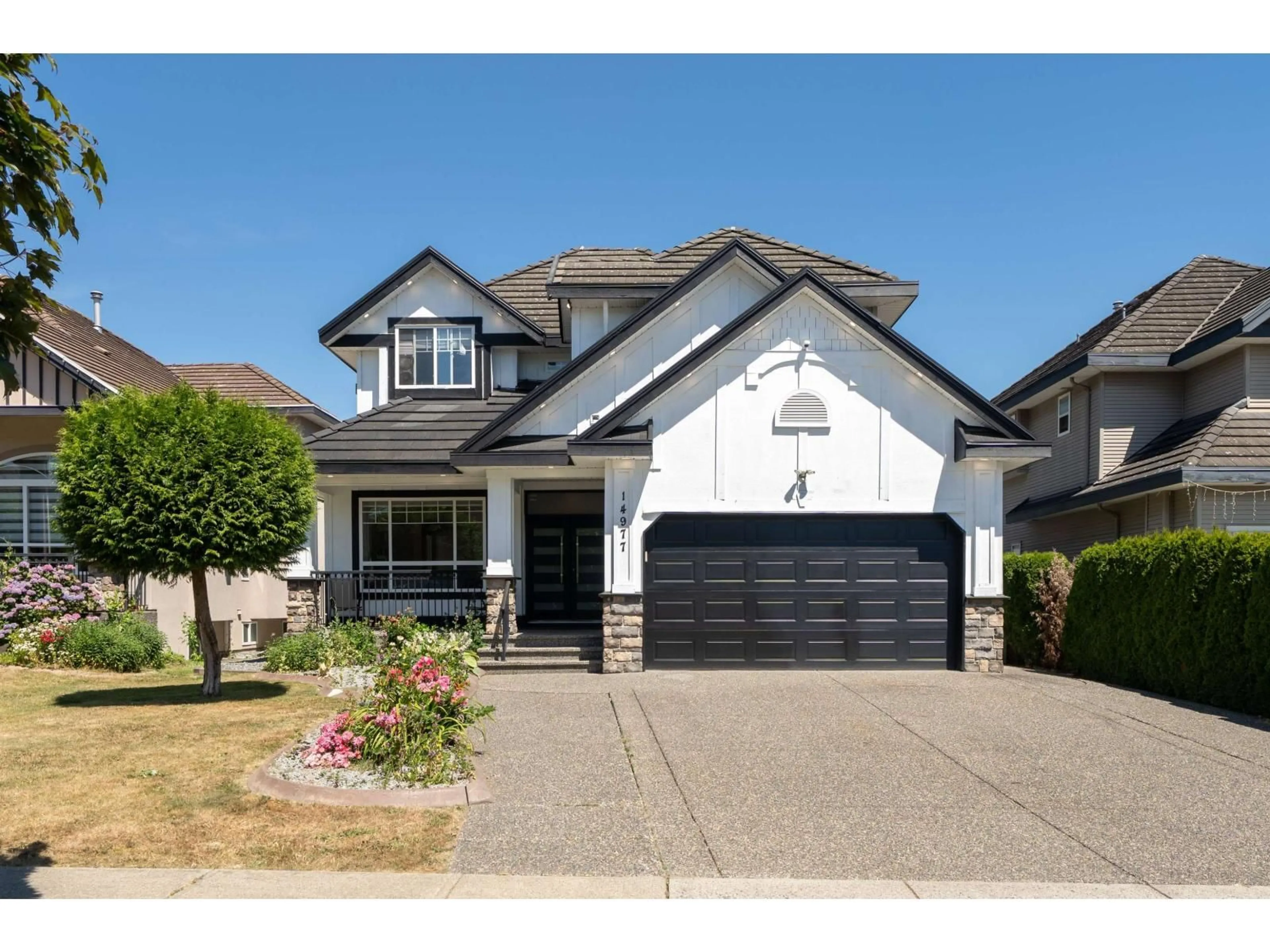 Home with vinyl exterior material, street for 14977 69 AVENUE, Surrey British Columbia V3S0Y8