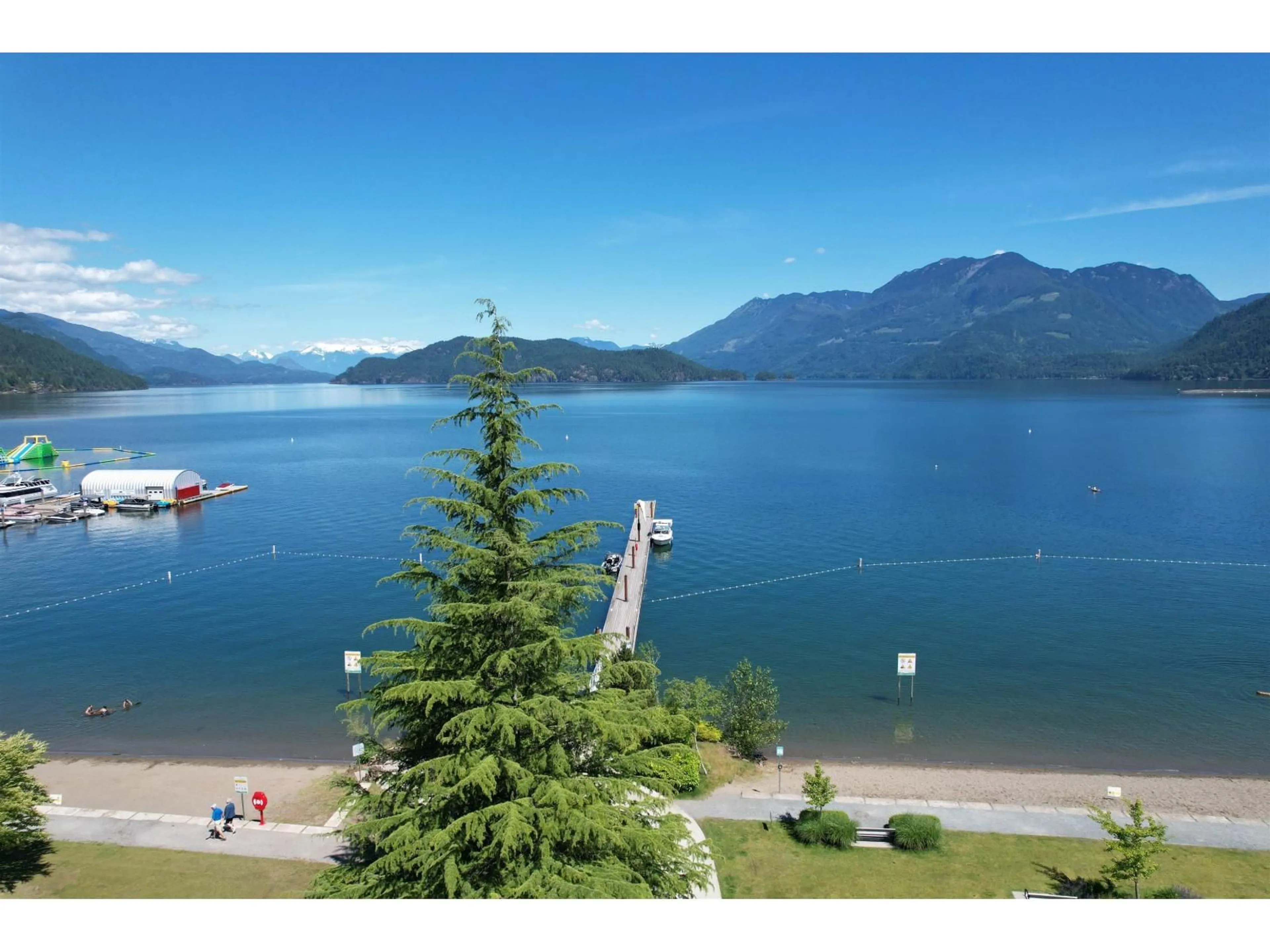 A pic from outside/outdoor area/front of a property/back of a property/a pic from drone, water/lake/river/ocean view for 201 - 120 ESPLANADE AVENUE, Harrison Hot Springs British Columbia V0M1K0