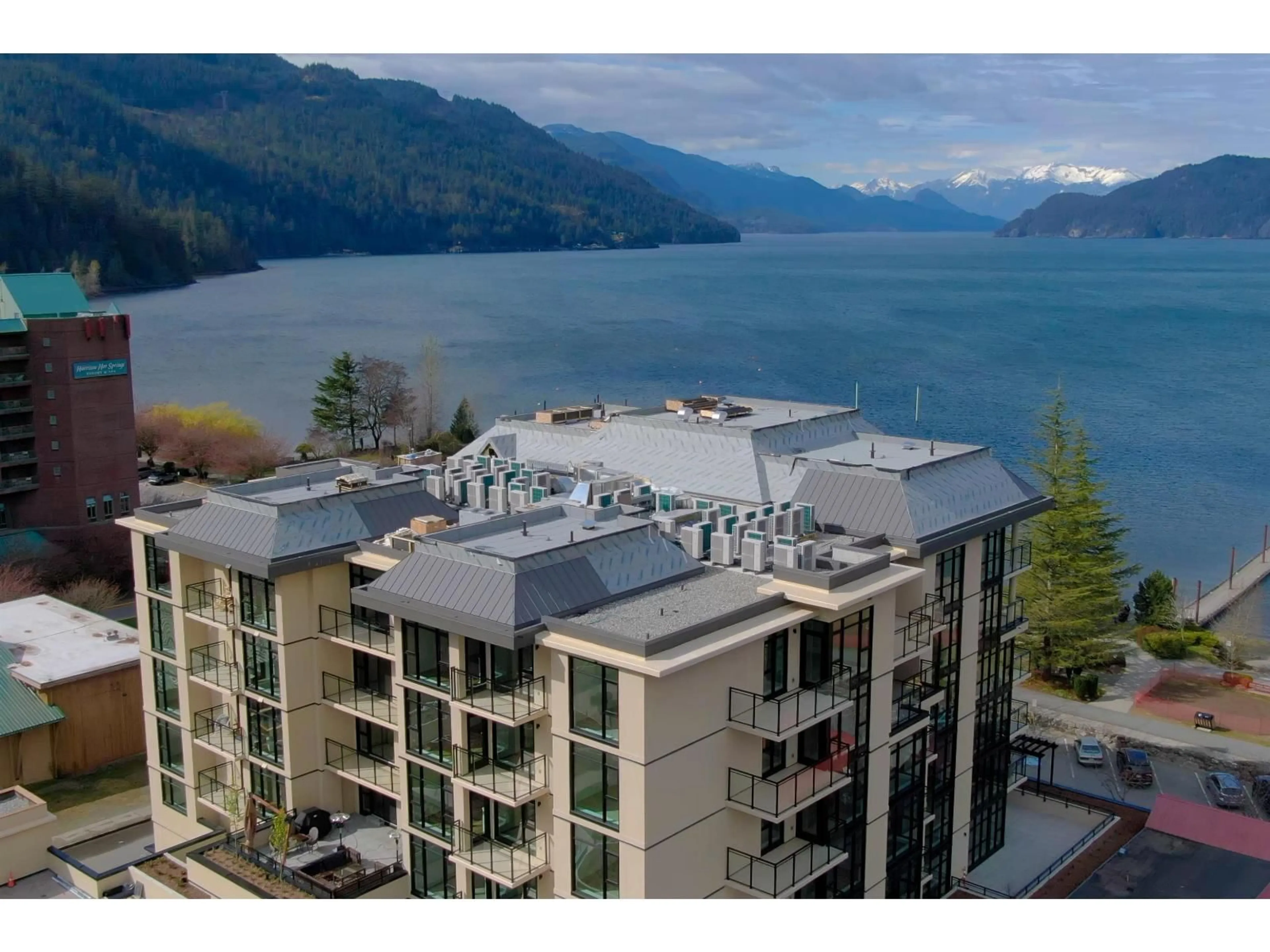 A pic from outside/outdoor area/front of a property/back of a property/a pic from drone, water/lake/river/ocean view for 404 - 120 ESPLANADE AVENUE, Harrison Hot Springs British Columbia V0M1K0