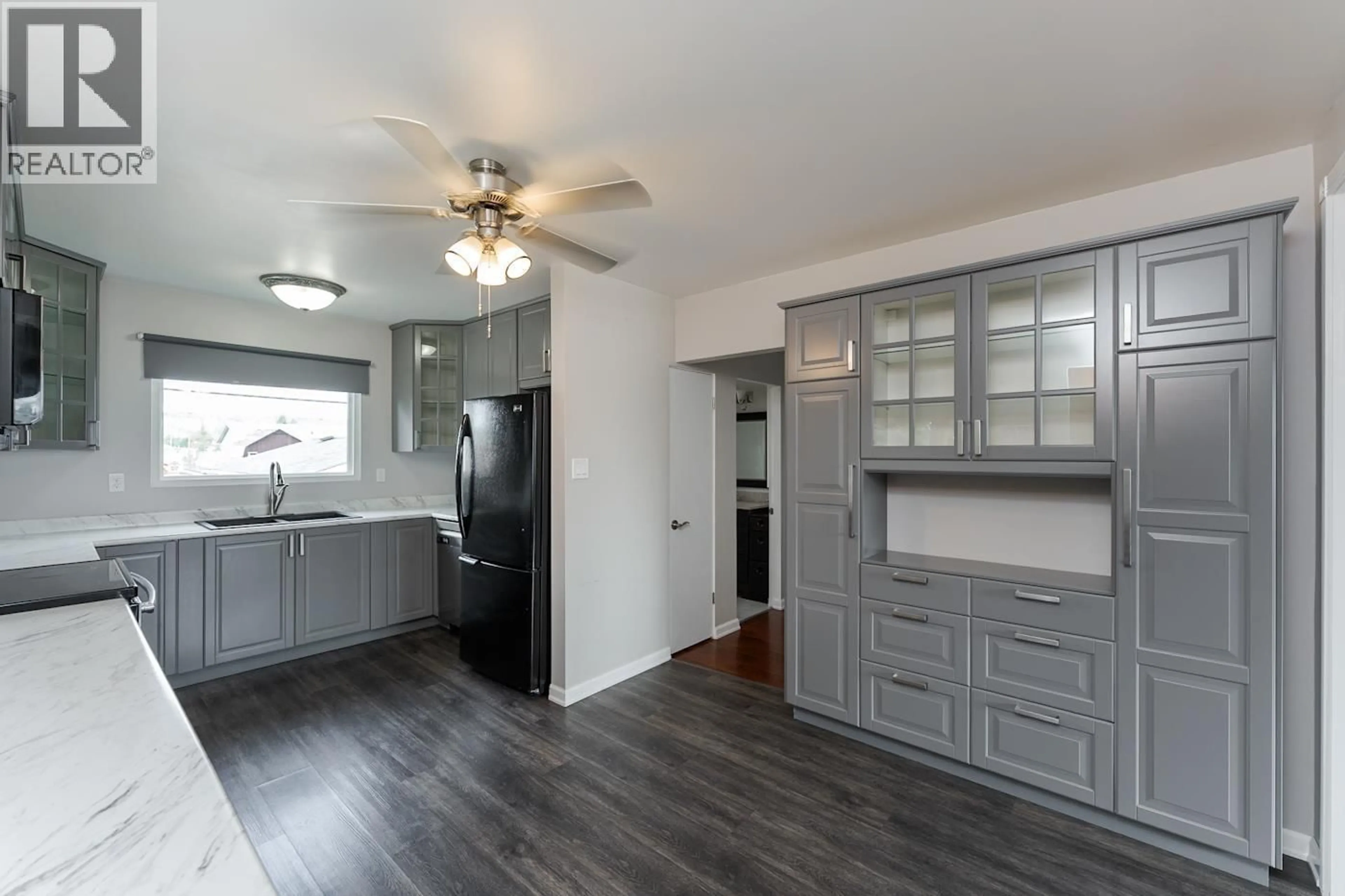 Open concept kitchen, wood/laminate floor for 373 NICHOLSON STREET, Prince George British Columbia V2M3L8